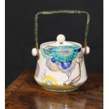 A Clarice Cliff Bizarre Biscaria pattern biscuit barrel and cover, painted with green and blue