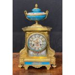 A 19th century French porcelain mounted gilt metal mantel clock, 10.5cm dial inscribed with Roman