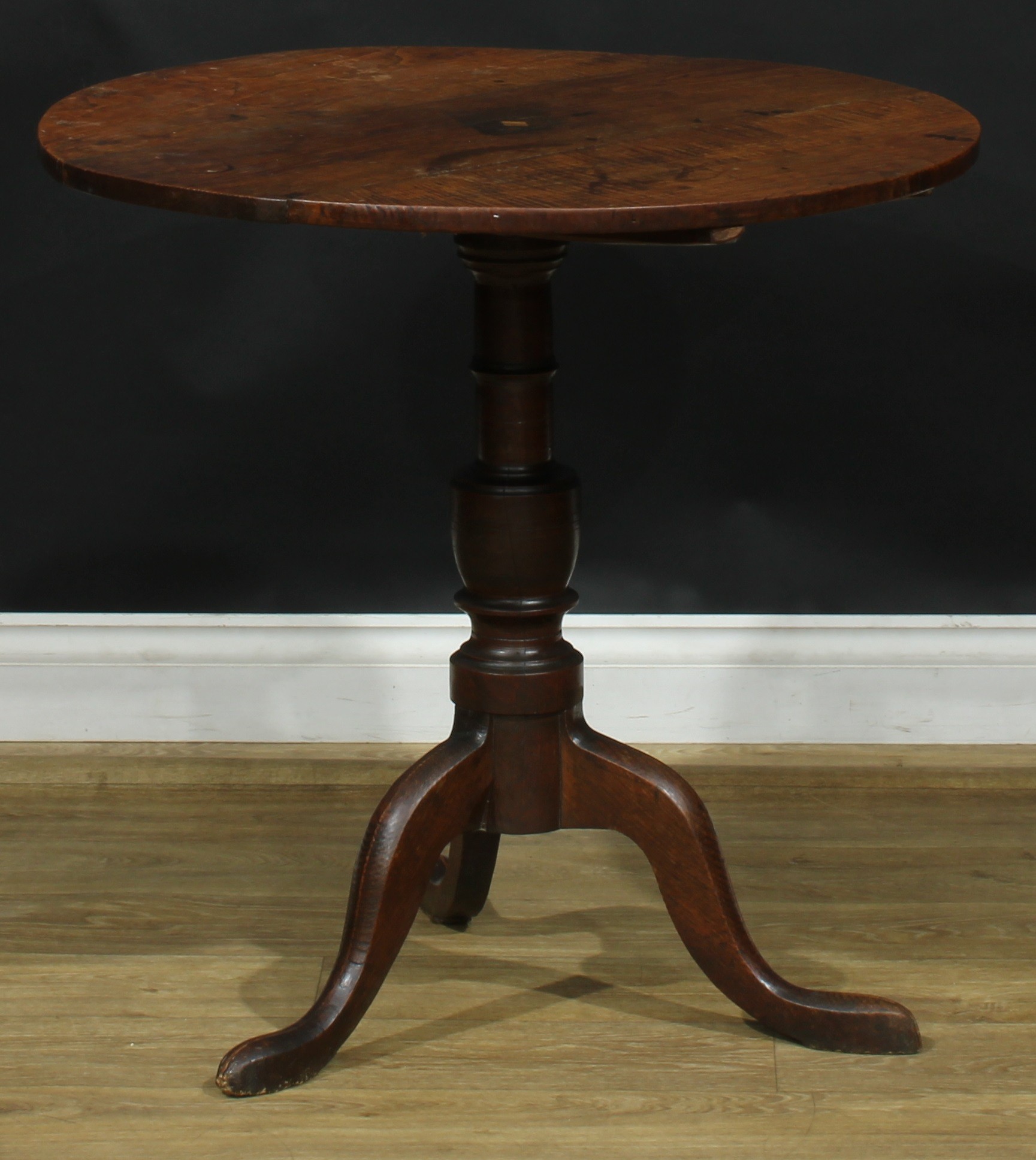 A George III elm and oak tripod occasional table, fixed near-circular top centred by a featherbanded - Image 3 of 3