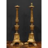 A pair of tall early 20th century giltwood and gesso table lamps, as North European altar