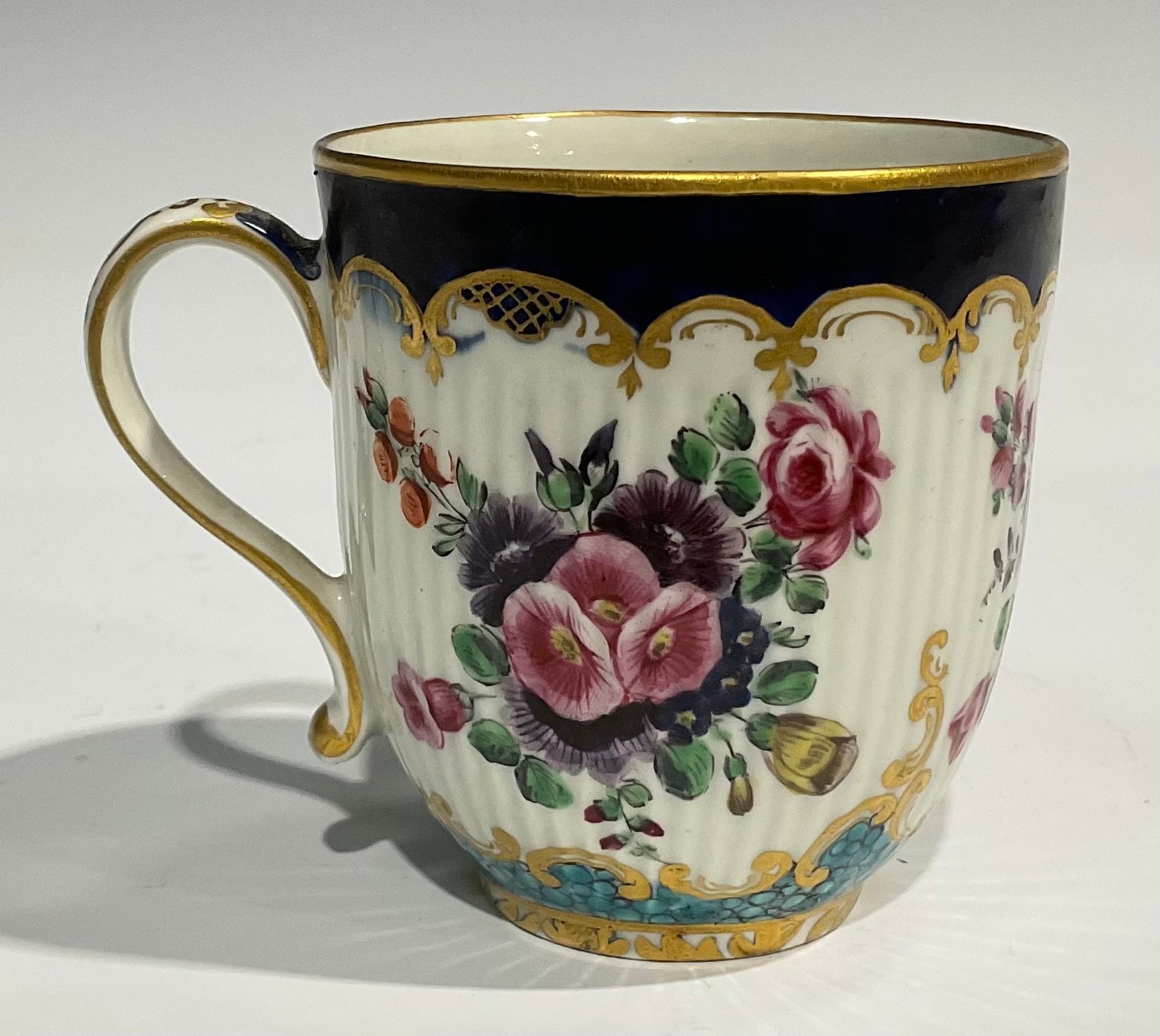 A Worcester fluted teacup and saucer, circular cartouches painted with lakeside scenes, edged with a - Image 7 of 11