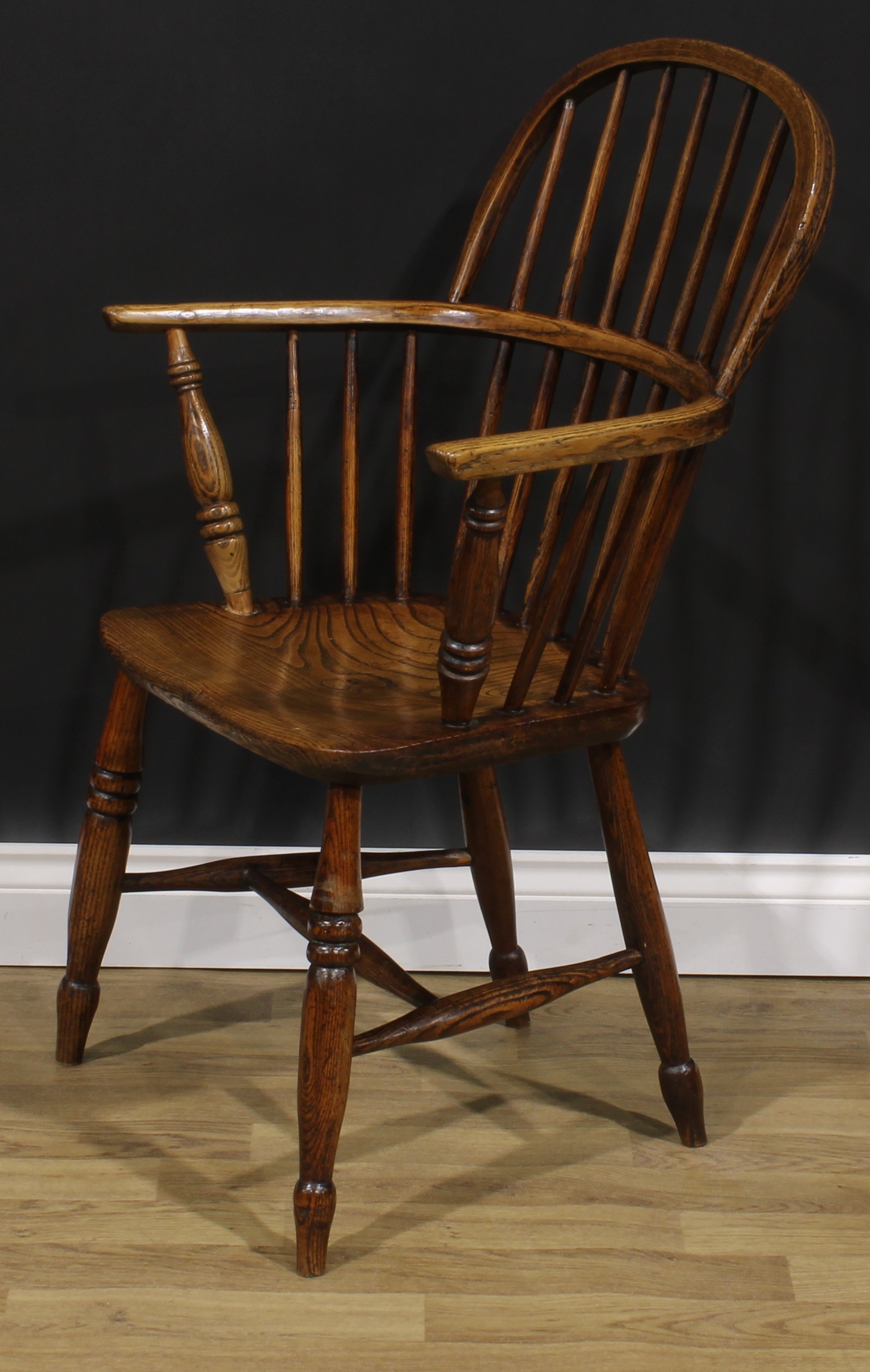A 19th century ash and elm Windsor elbow chair, low hoop back, saddle seat, H-stretcher, 95cm - Image 3 of 4