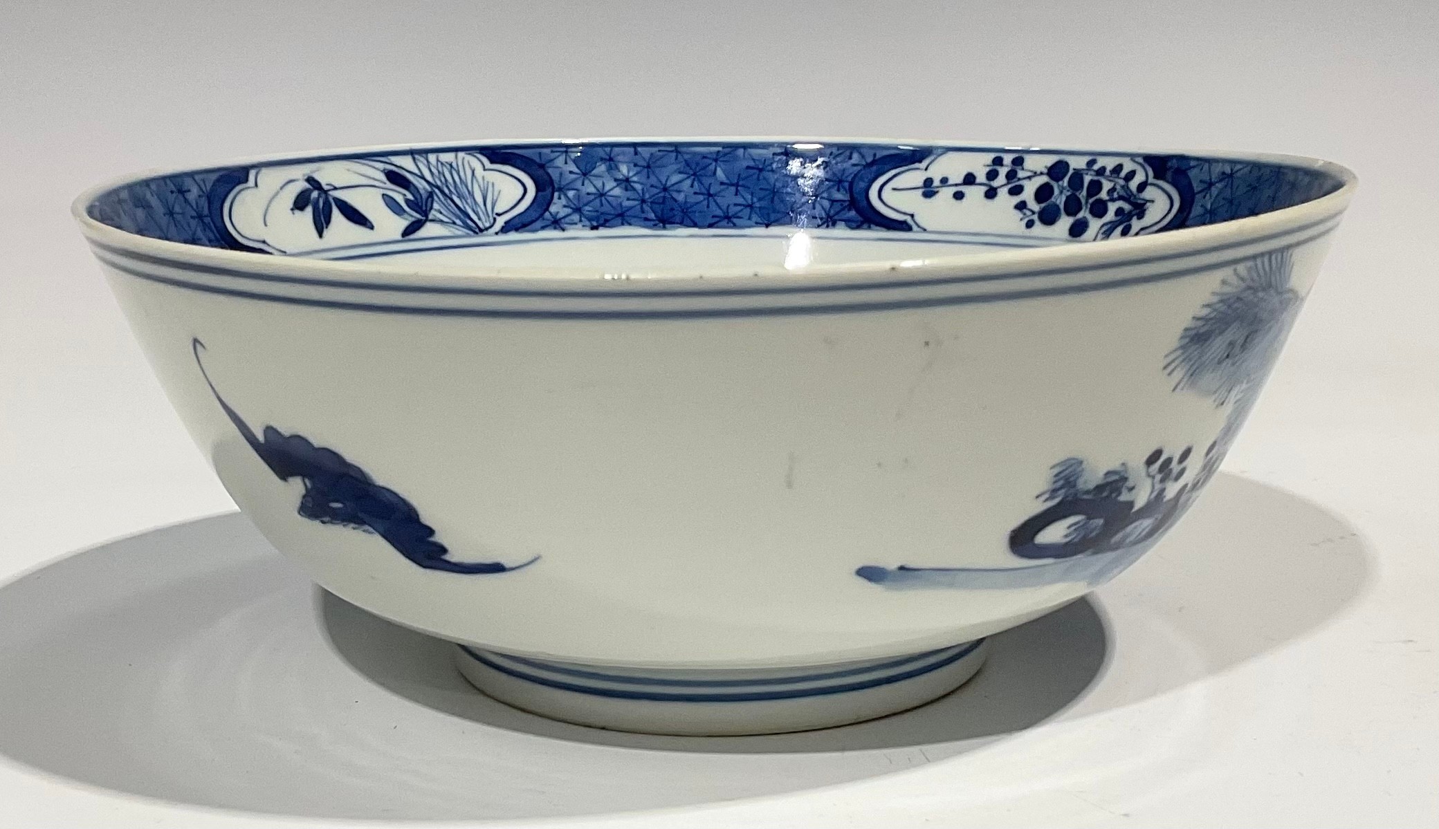 A Chinese circular bowl, playing in tones of underglaze blue with figures in a monumental landscape, - Image 8 of 8