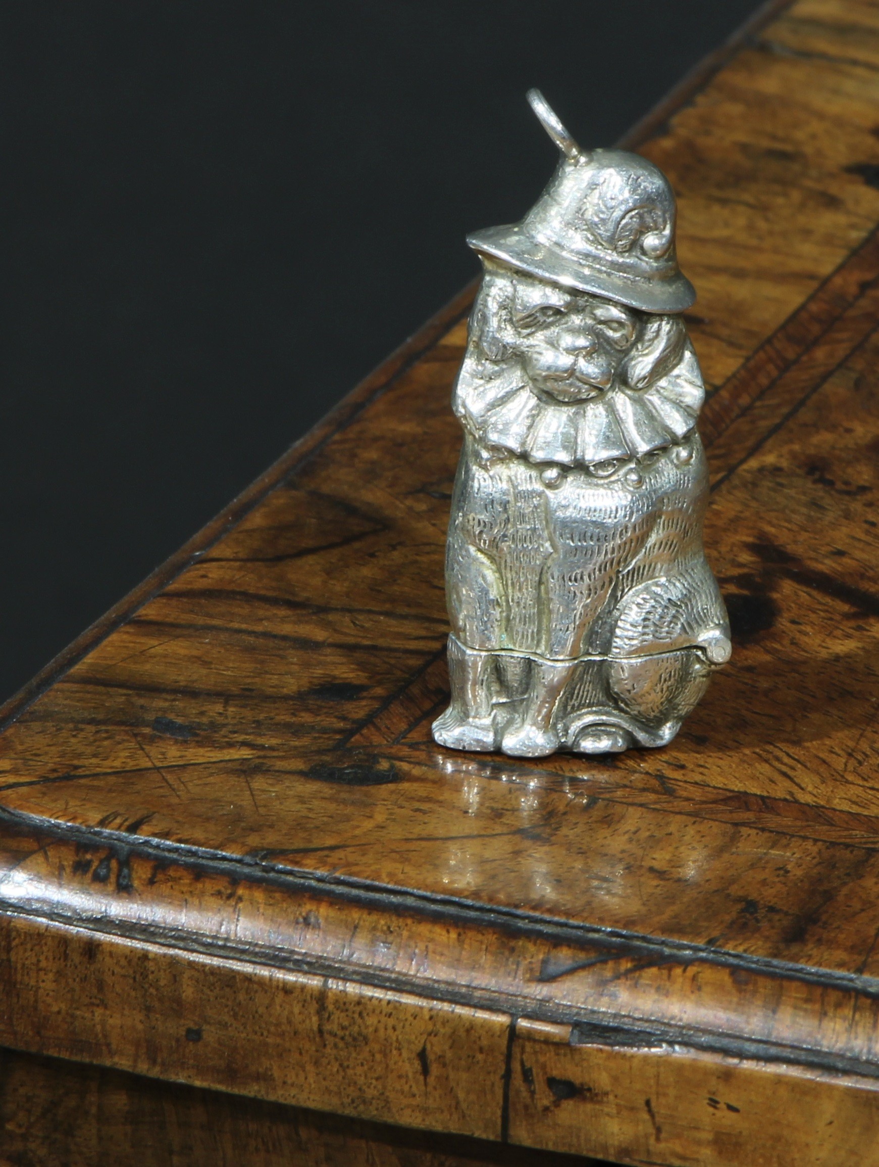 A silver novelty vesta case, cast as Mr Punch’s Dog Toby, 5.5cm long, marked Sterling