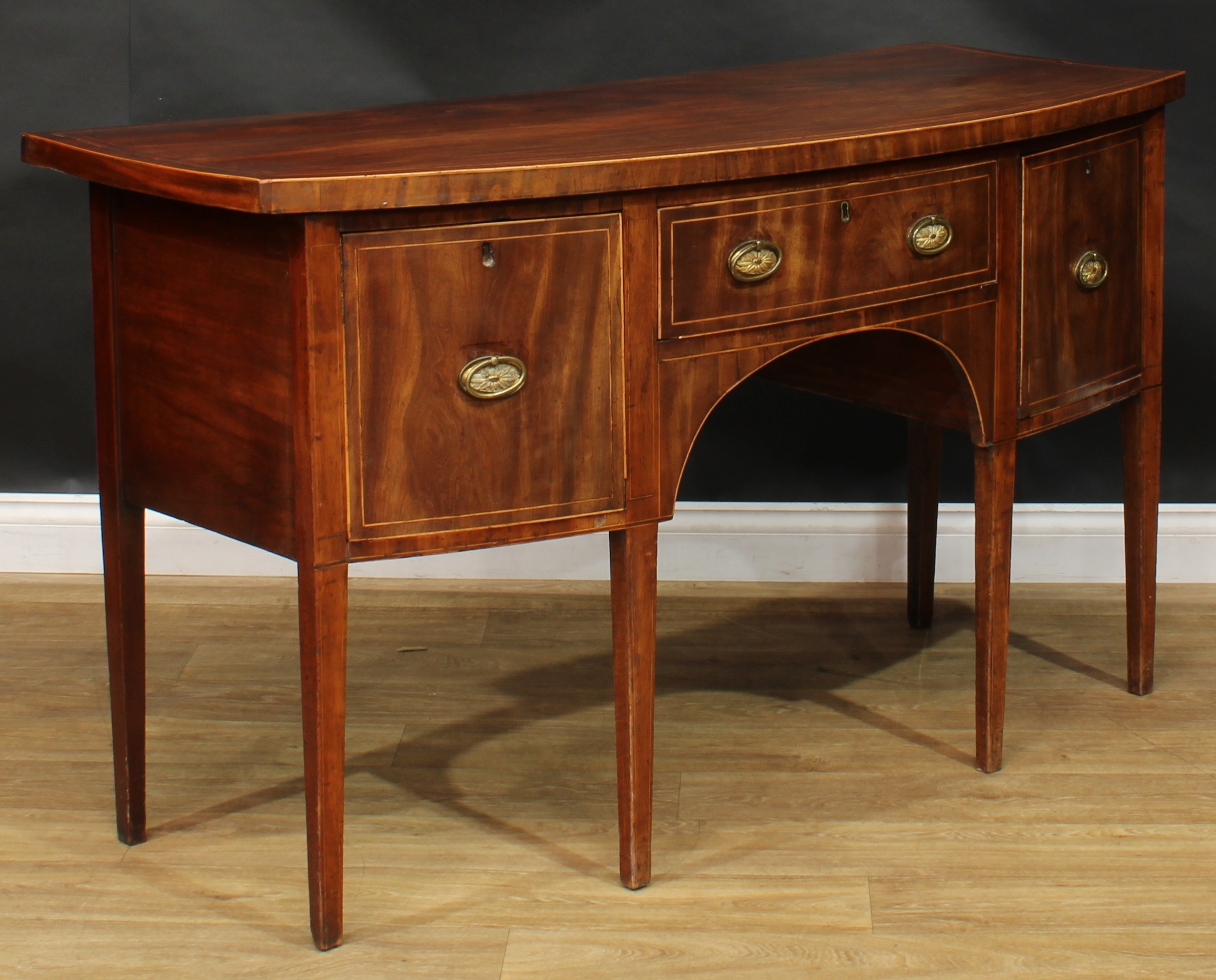 A George III mahogany bowfront sideboard or serving table, oversailing satinwood banded top above - Image 3 of 6