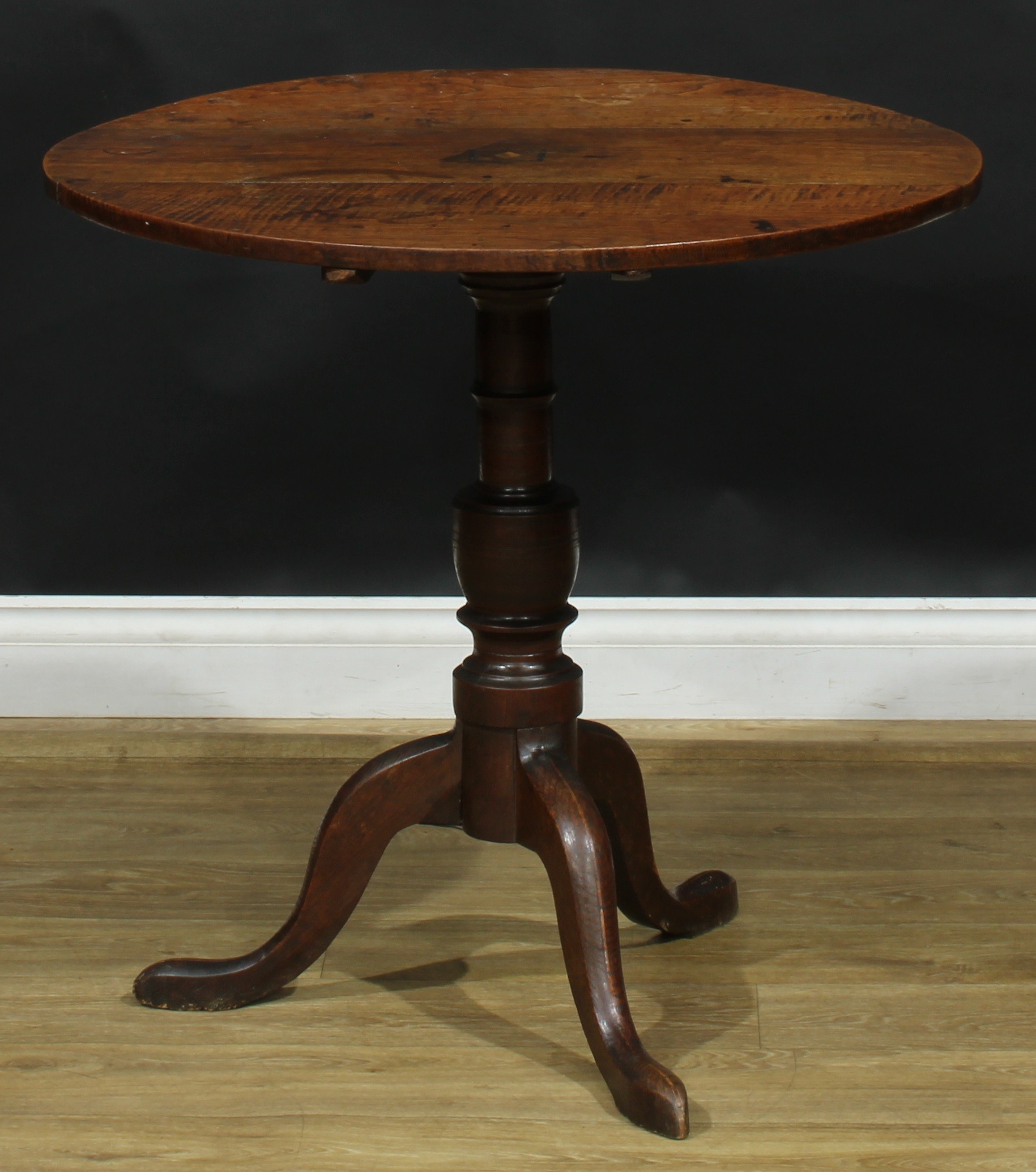 A George III elm and oak tripod occasional table, fixed near-circular top centred by a featherbanded - Image 2 of 3