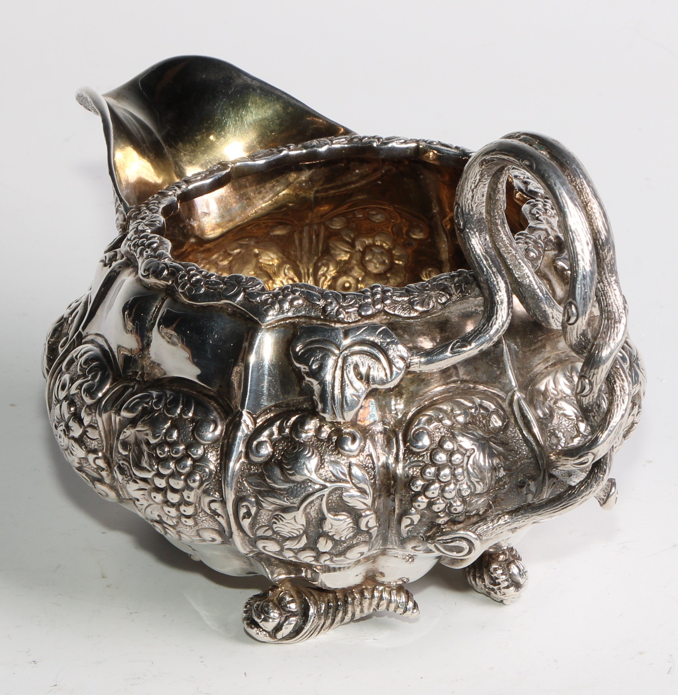 A George IV silver three piece melon shaped tea service, comprising teapot, milk jug and sugar - Image 10 of 14