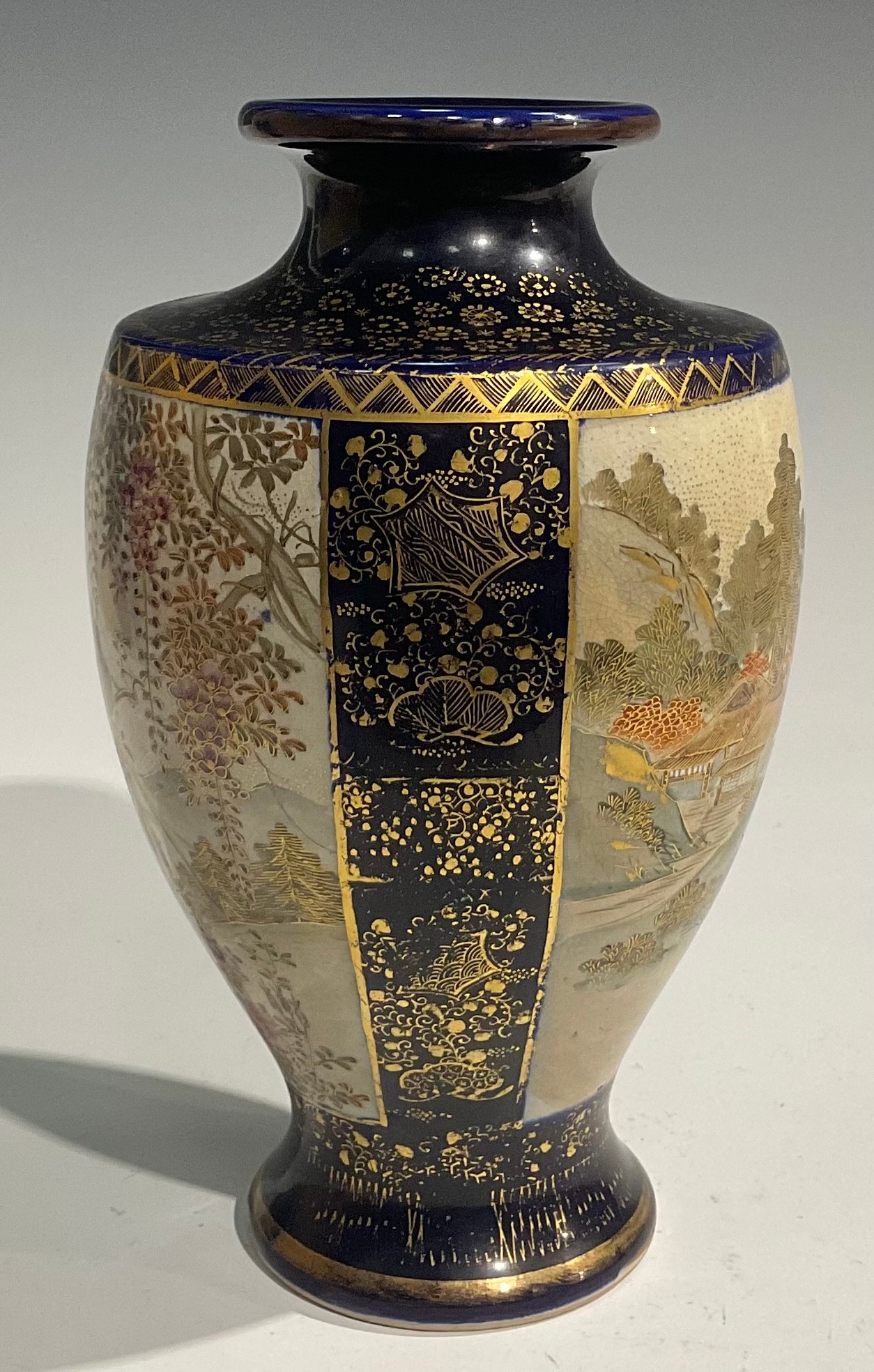 A pair of Japanese satsuma baluster vases, decorated with traditional landscape and bird panels, - Image 4 of 12