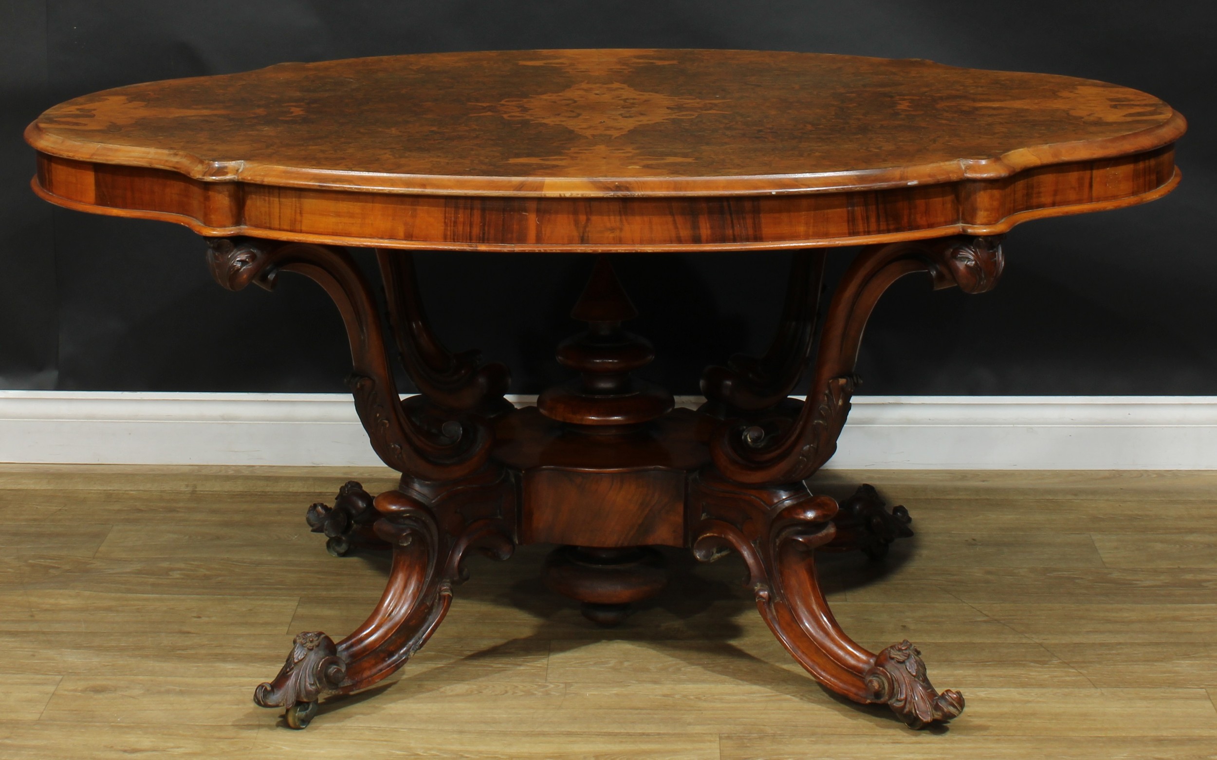 A Victorian walnut basket-base centre table, quarter-veneered burr top with moulded edge, S-scroll - Image 2 of 5