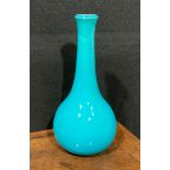 A Burmantofts Faience mallet shaped vase, glazed throughout in turquoise, 21cm high, shape number