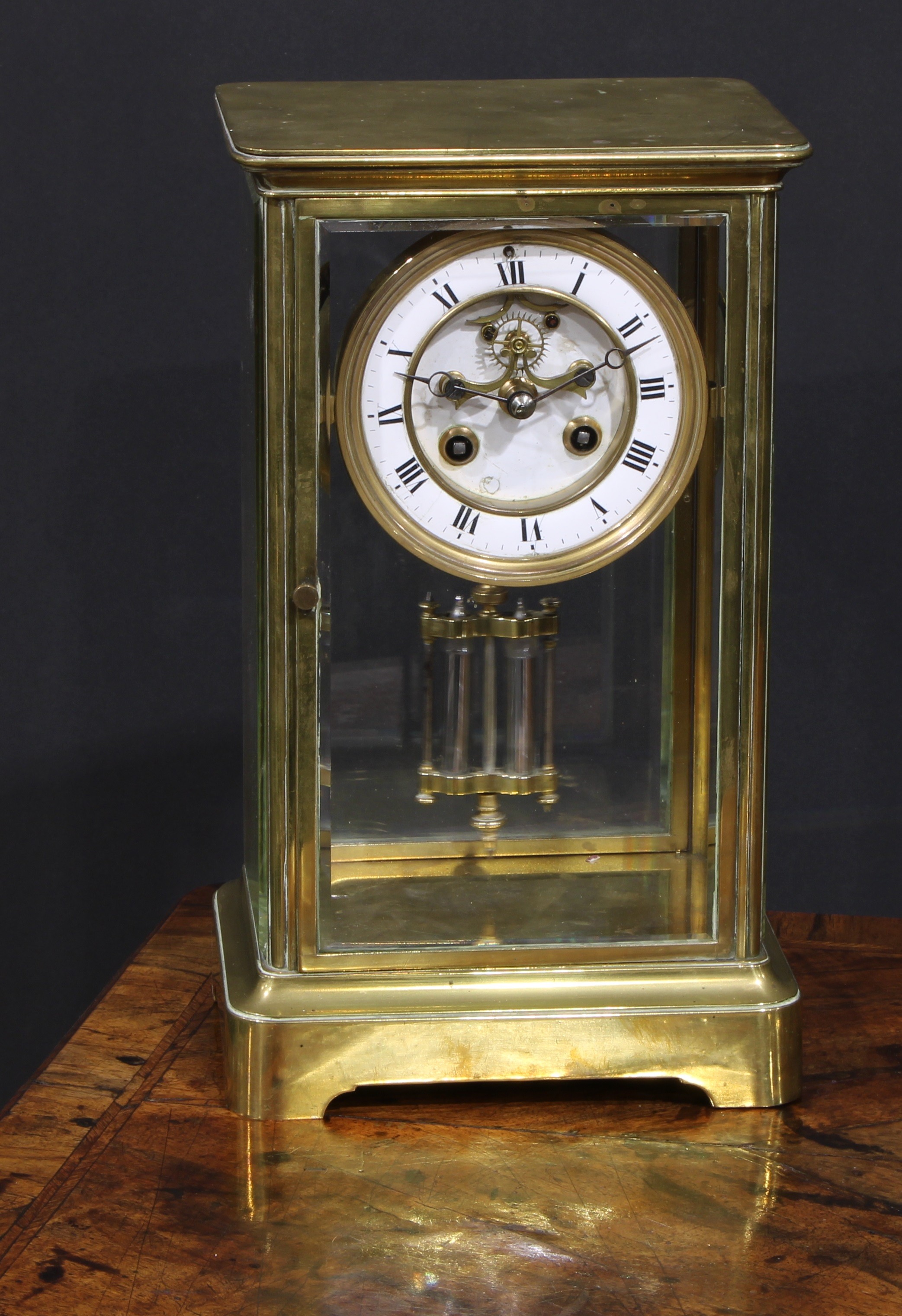 A late 19th century French lacquered brass four glass mantel clock, 9.5cm dial with Arabic chapter