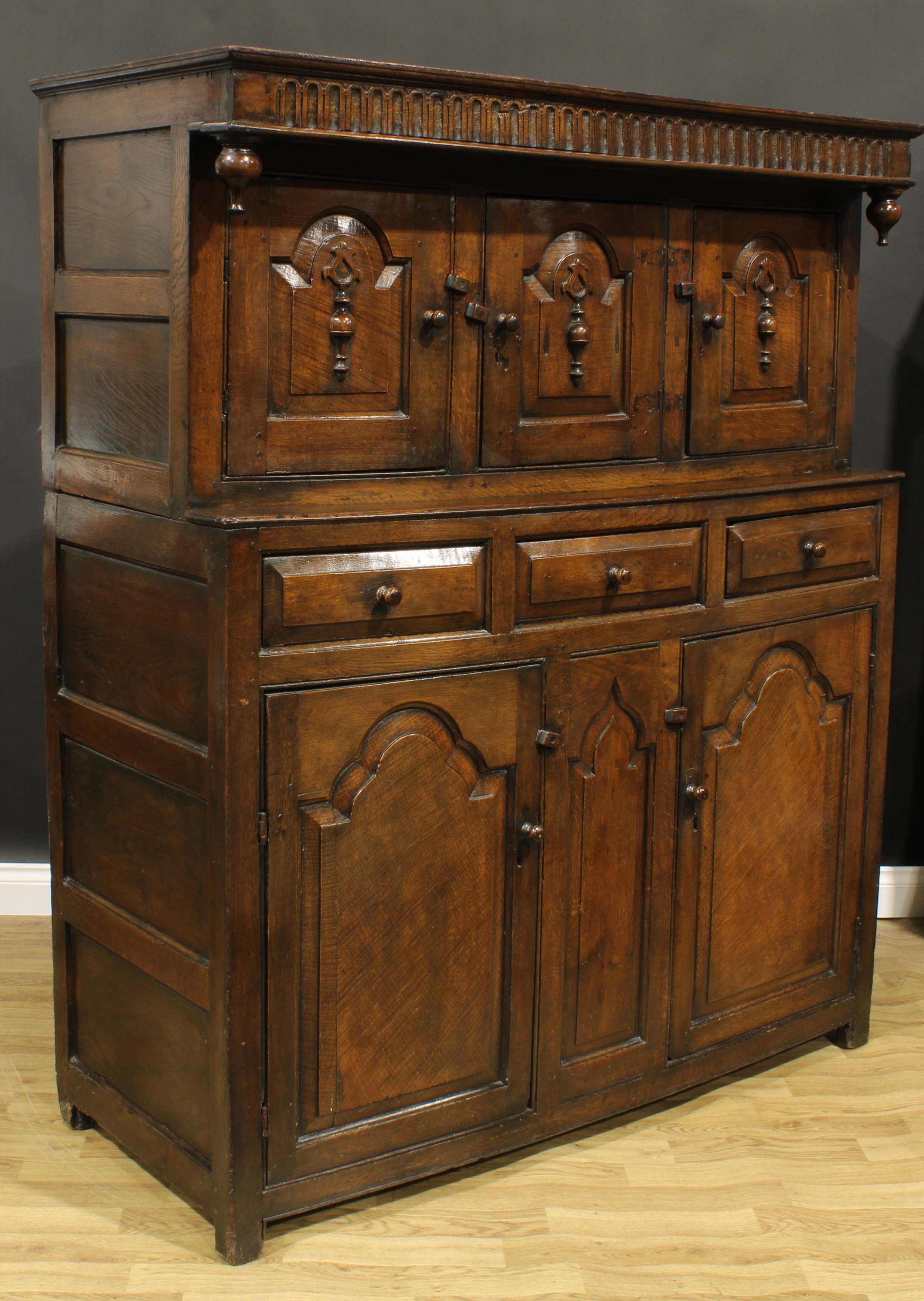 A 17th century style oak duodarn, rectangular top with nulled frieze above three raised and - Image 3 of 3