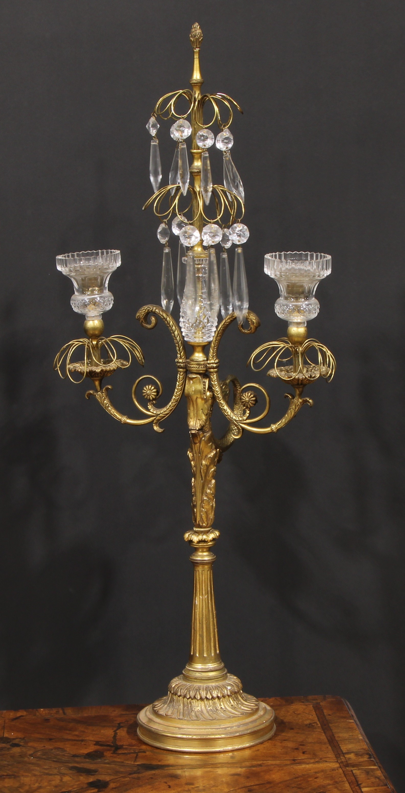 A 19th century French gilt bronze and hobnail-cut glass two-branch lustre candelabra, cast with a