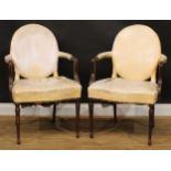 A pair of 19th century French Hepplewhite design elbow chairs, stuffed-over upholstery, stop-