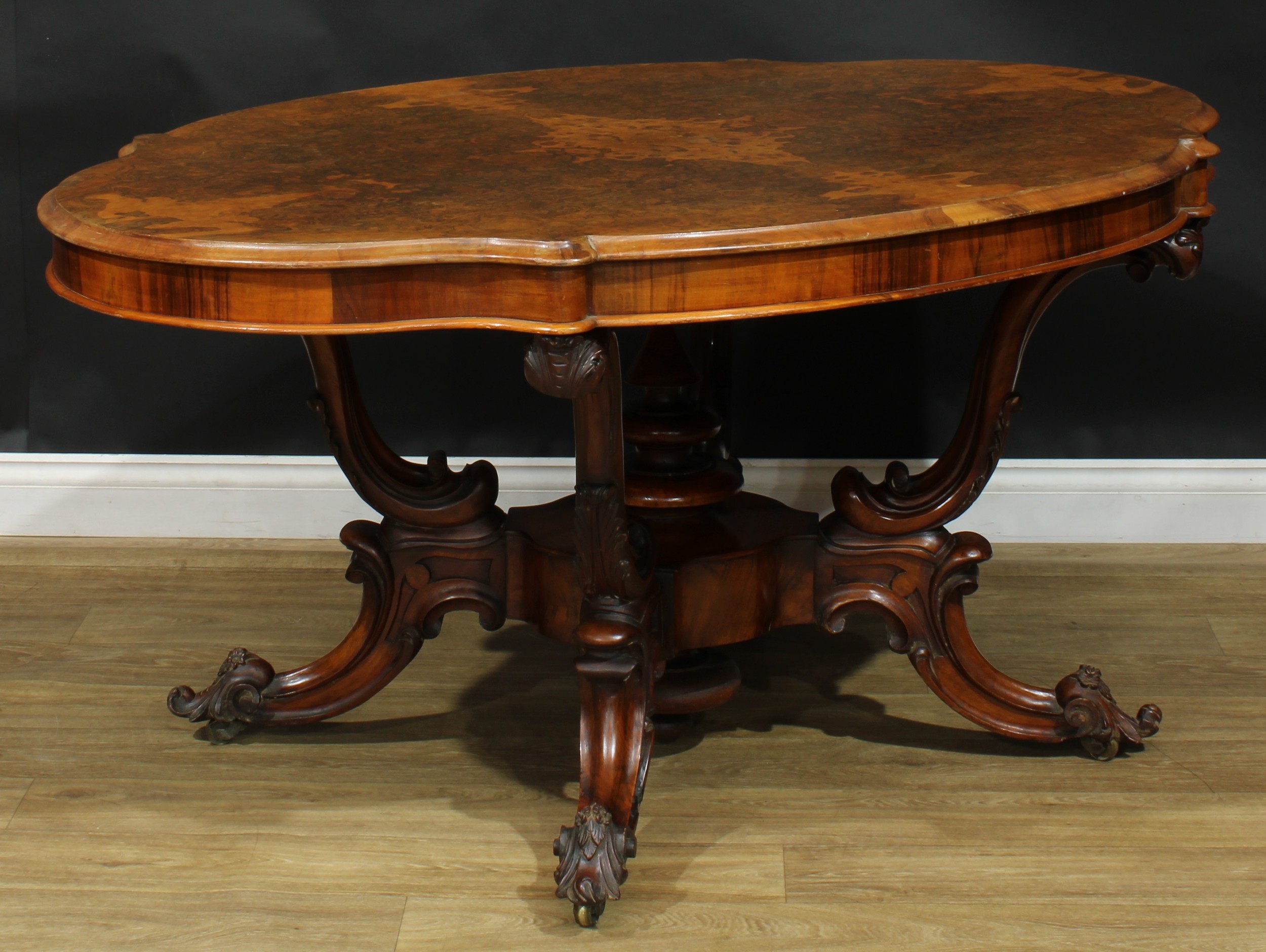 A Victorian walnut basket-base centre table, quarter-veneered burr top with moulded edge, S-scroll - Image 3 of 5