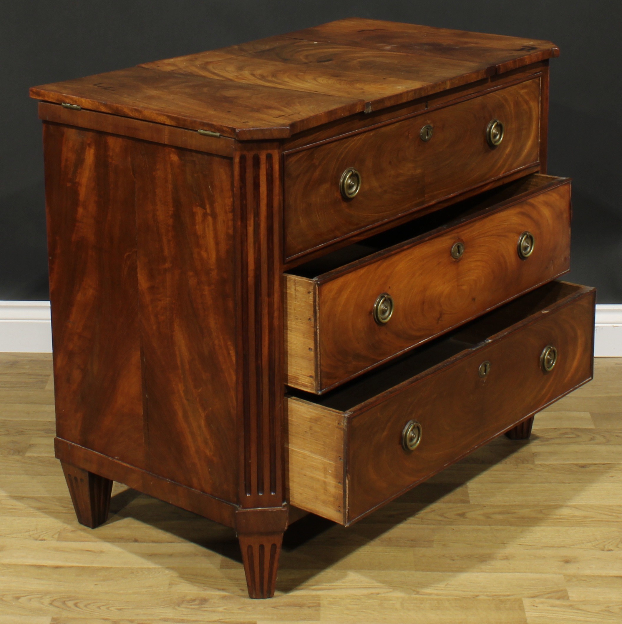 A 19th century Dutch mahogany dressing chest, tripartite hinged top, the centre enclosing a - Image 4 of 6