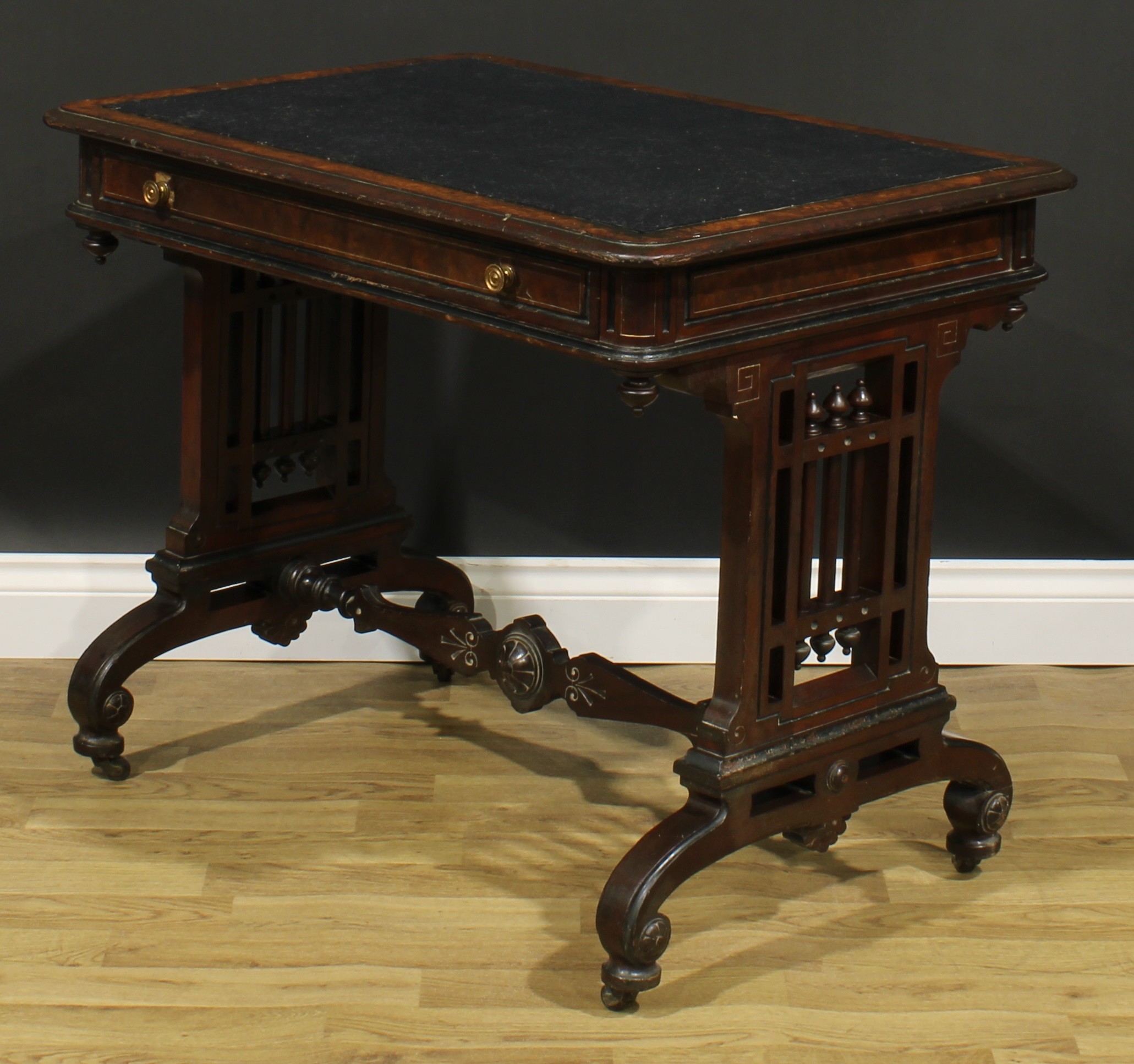 A late Victorian Aesthetic Movement walnut and mahogany writing table, rounded rectangular top above - Image 5 of 6