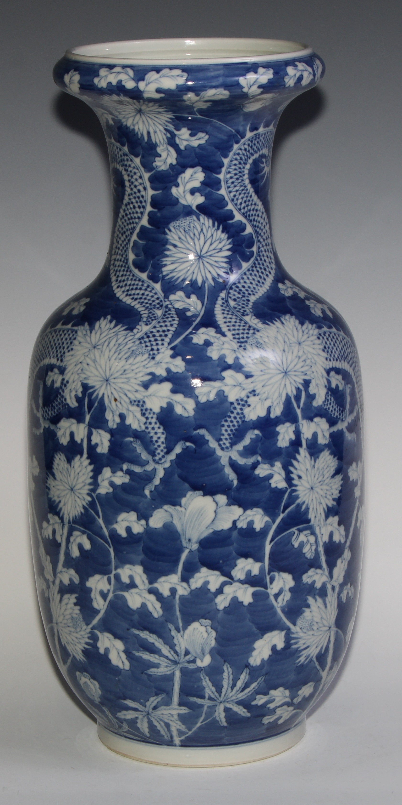 A large Chinese ovoid vase, painted in tones of underglaze blue with dragons amongst flowers and - Image 3 of 5