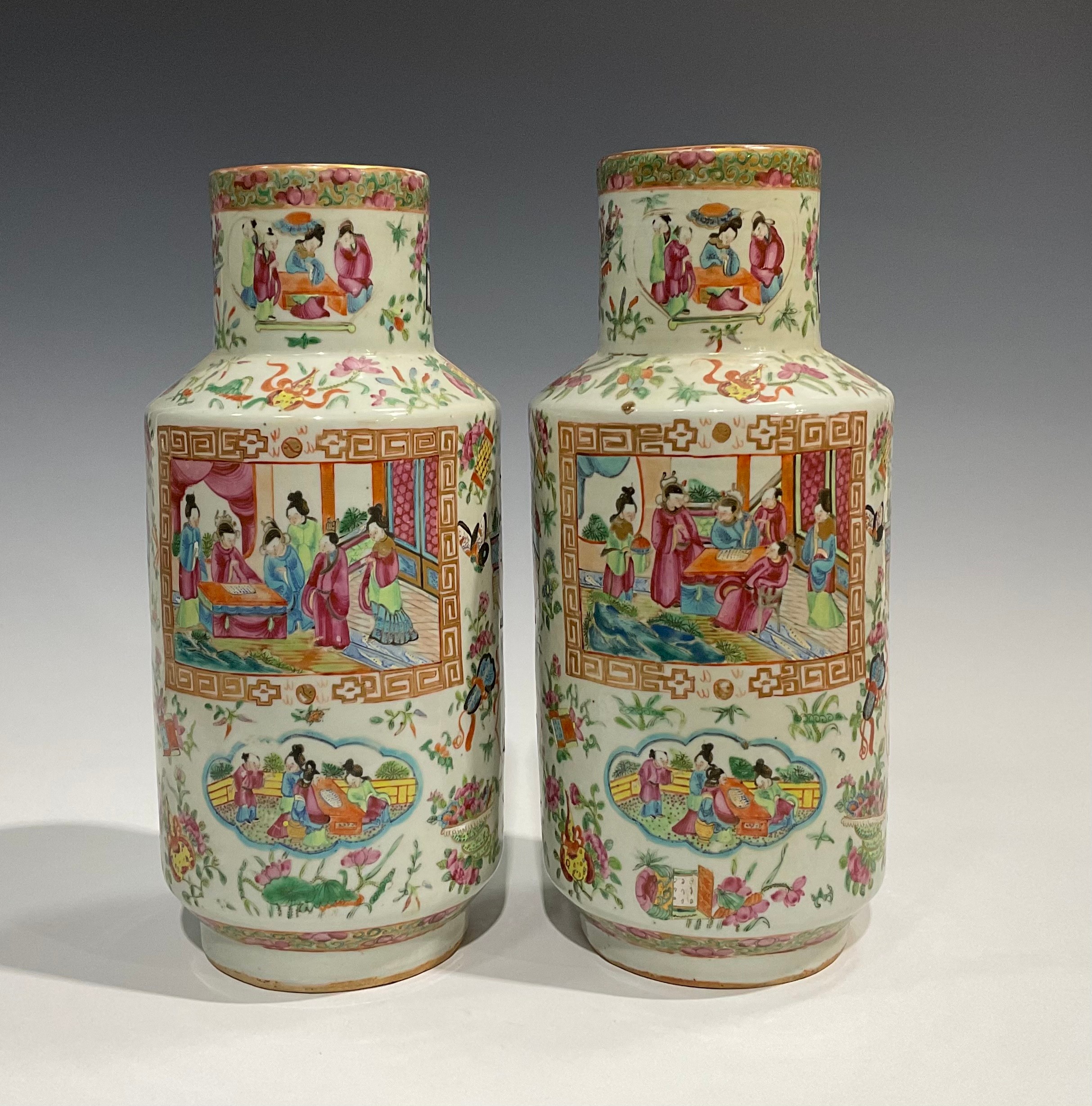 A pair of Cantonese Famille Rose cylindrical vases, decorated with alternating shaped panels of - Image 3 of 5