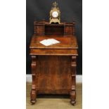 A 19th century burr yew Davenport desk, possibly Irish, shaped superstructure with a pair of small