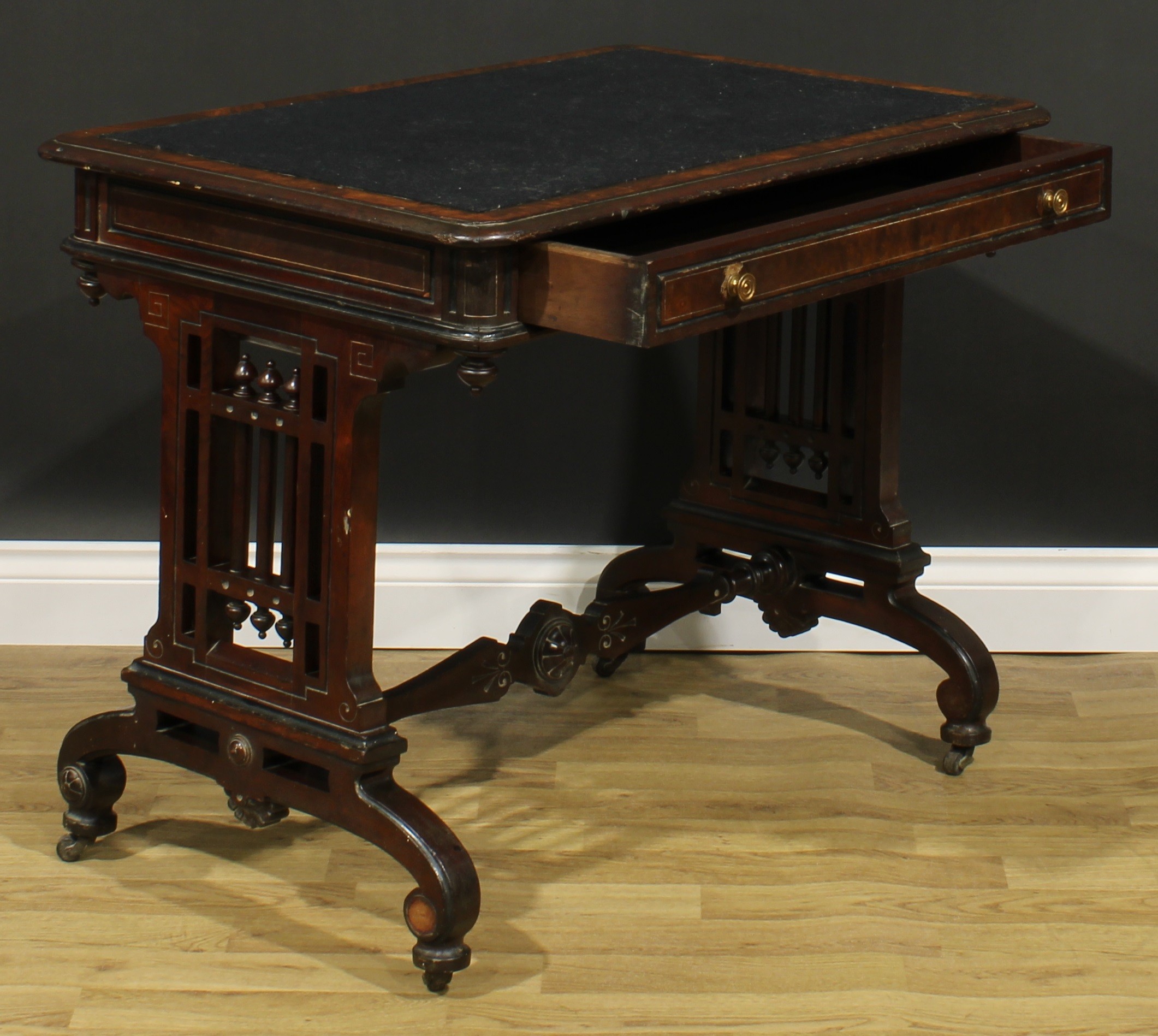 A late Victorian Aesthetic Movement walnut and mahogany writing table, rounded rectangular top above - Image 4 of 6