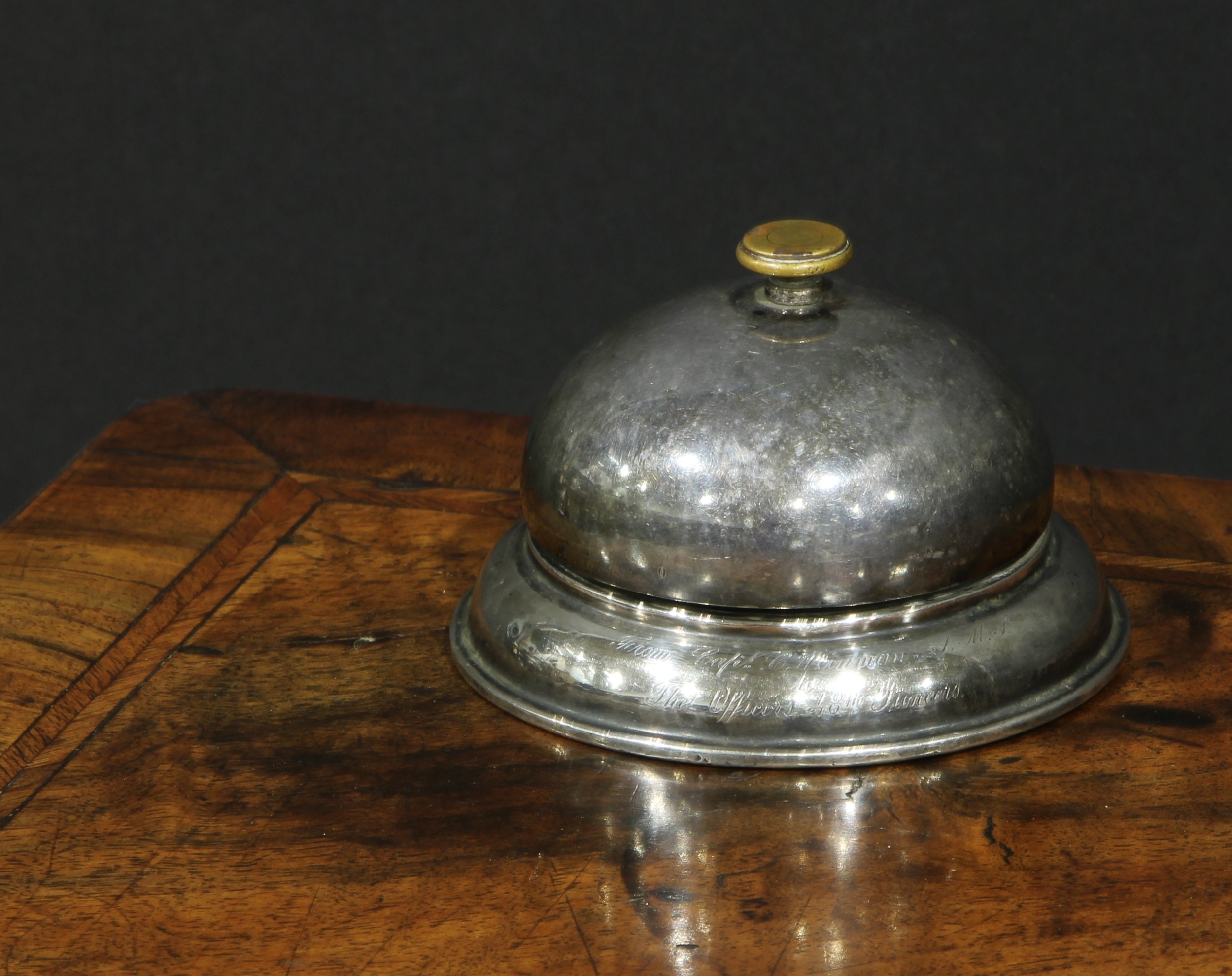 An Edwardian silver desk or counter bell, of military interest, inscribed From Capt. C Weinman to