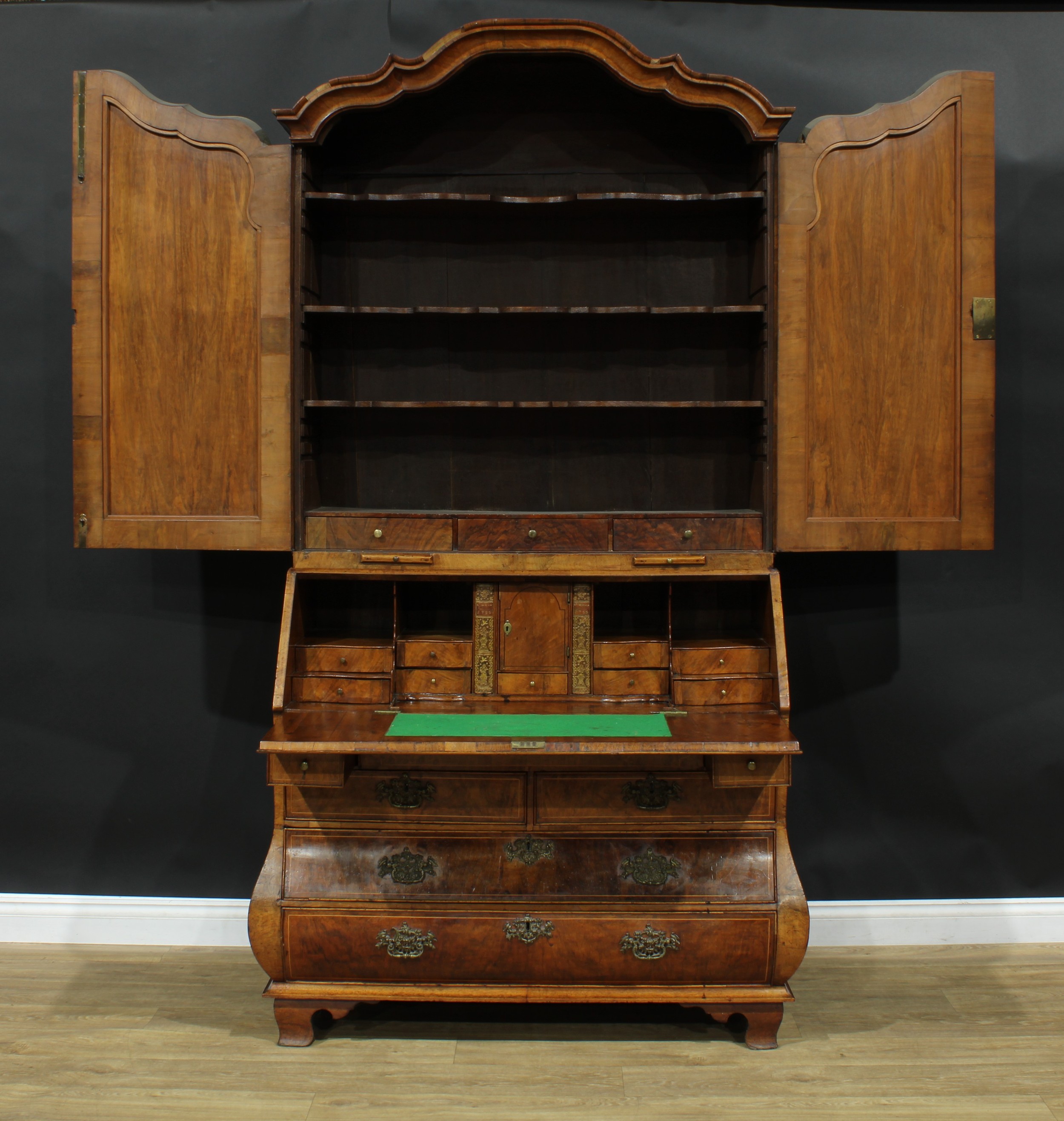 An 18th century Dutch walnut bureau book cabinet, the pair of panel doors above two candle slides - Image 5 of 9