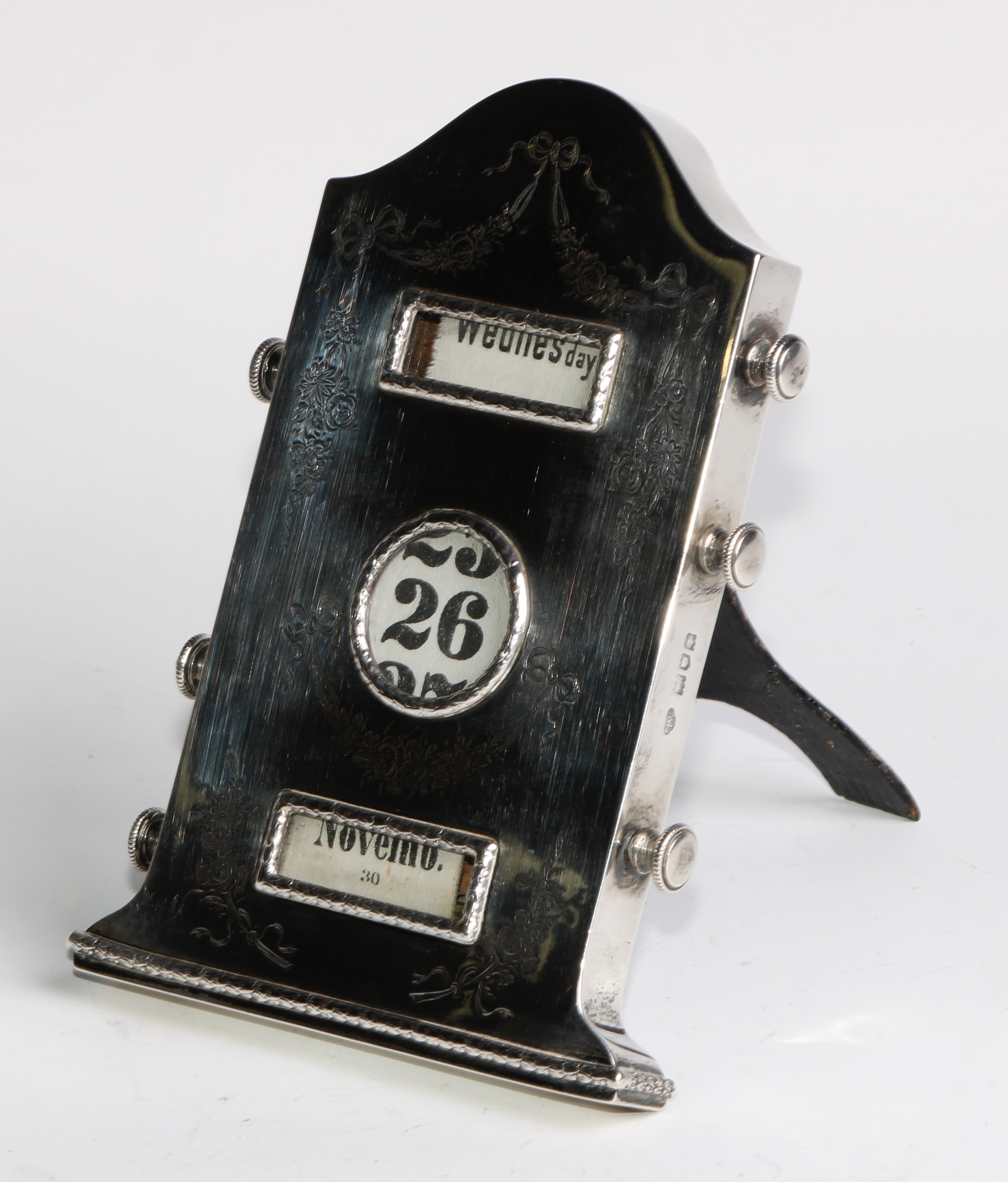 An Edwardian silver arched rectangular easel perpetual desk calendar, engraved in the Neo- - Image 3 of 4