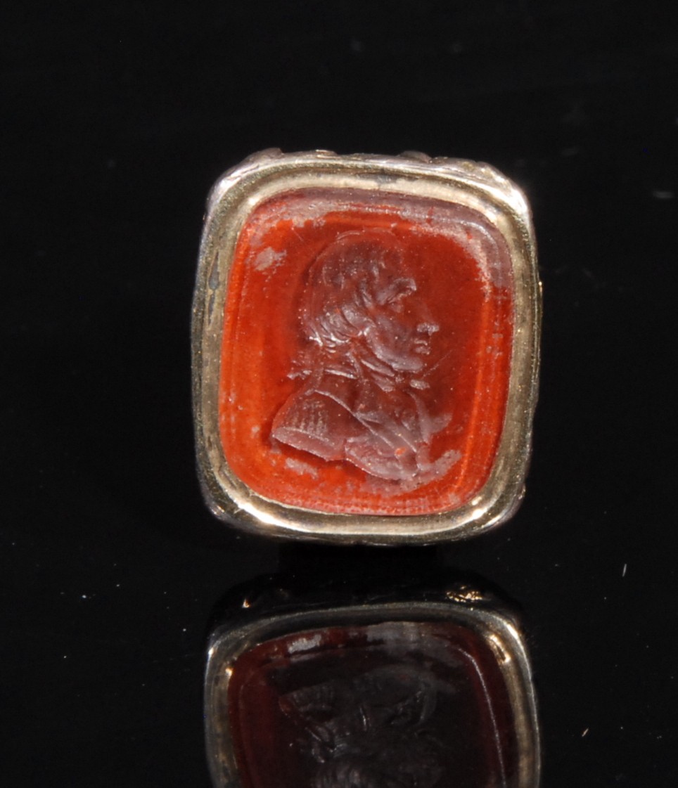A 19th century gilt metal fob seal, the carnelian matrix carved with a portrait bust of Horatio - Image 2 of 3
