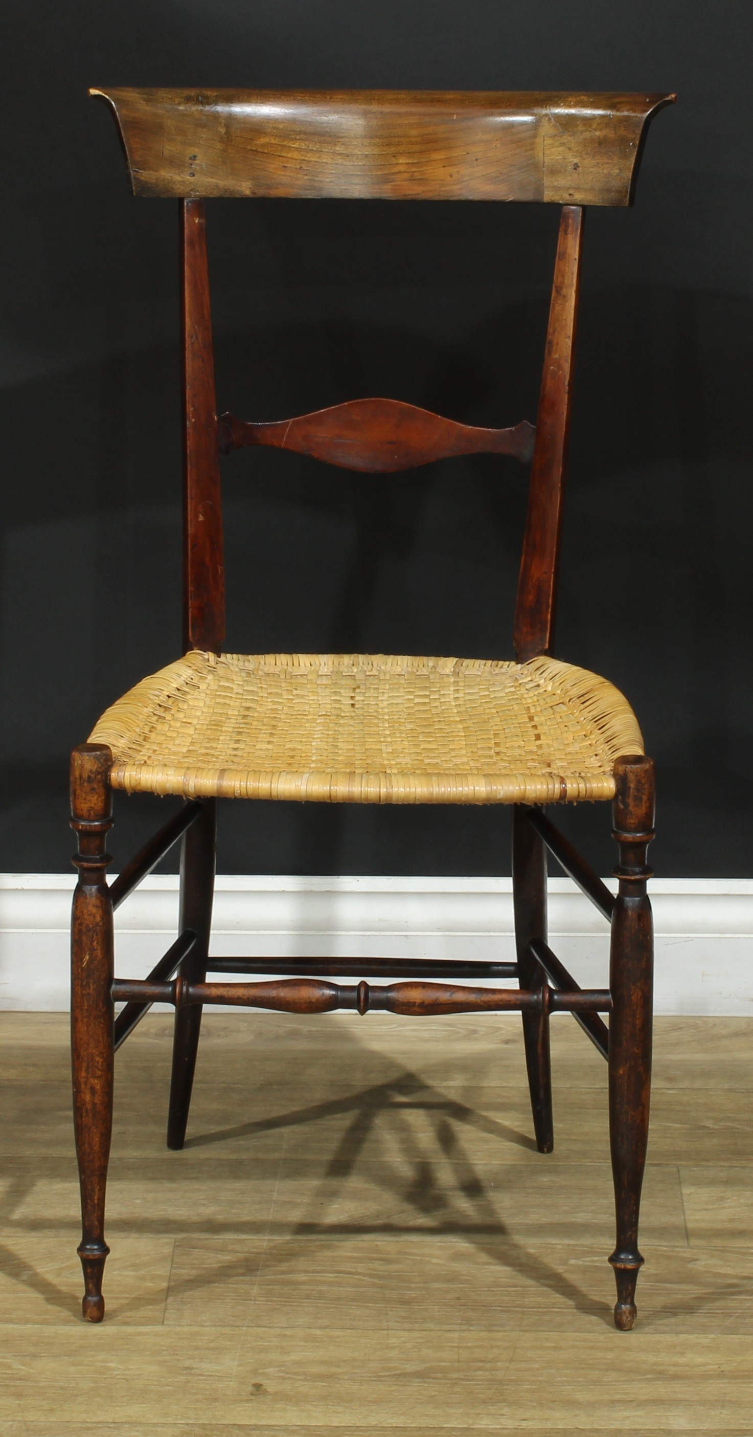 A 19th century Italian cherry Chiavari chair, designed by Giovanni Battista Ravenna, woven cane