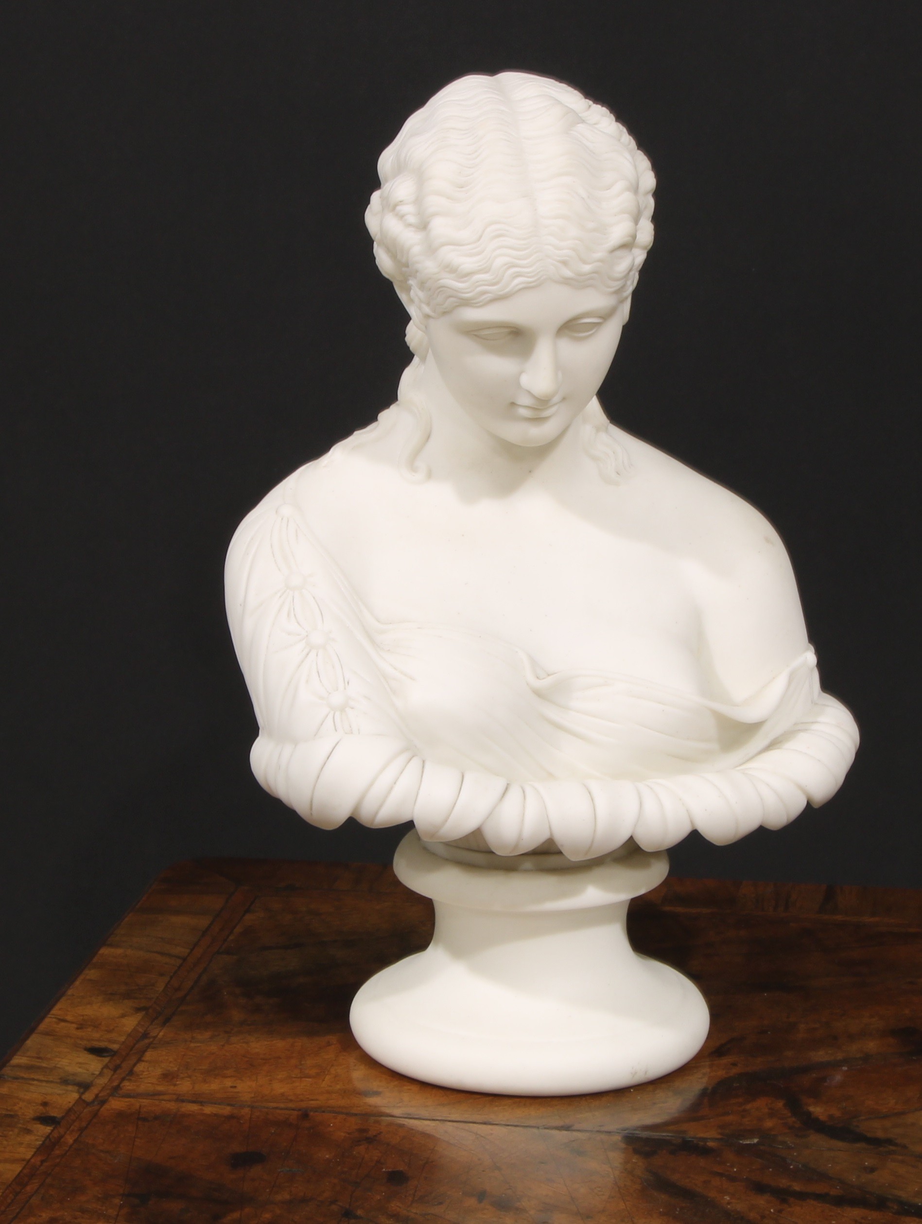 A 19th century Parian ware bust, of Clytie, after Delpech, turned socle, 30cm high, c.1870