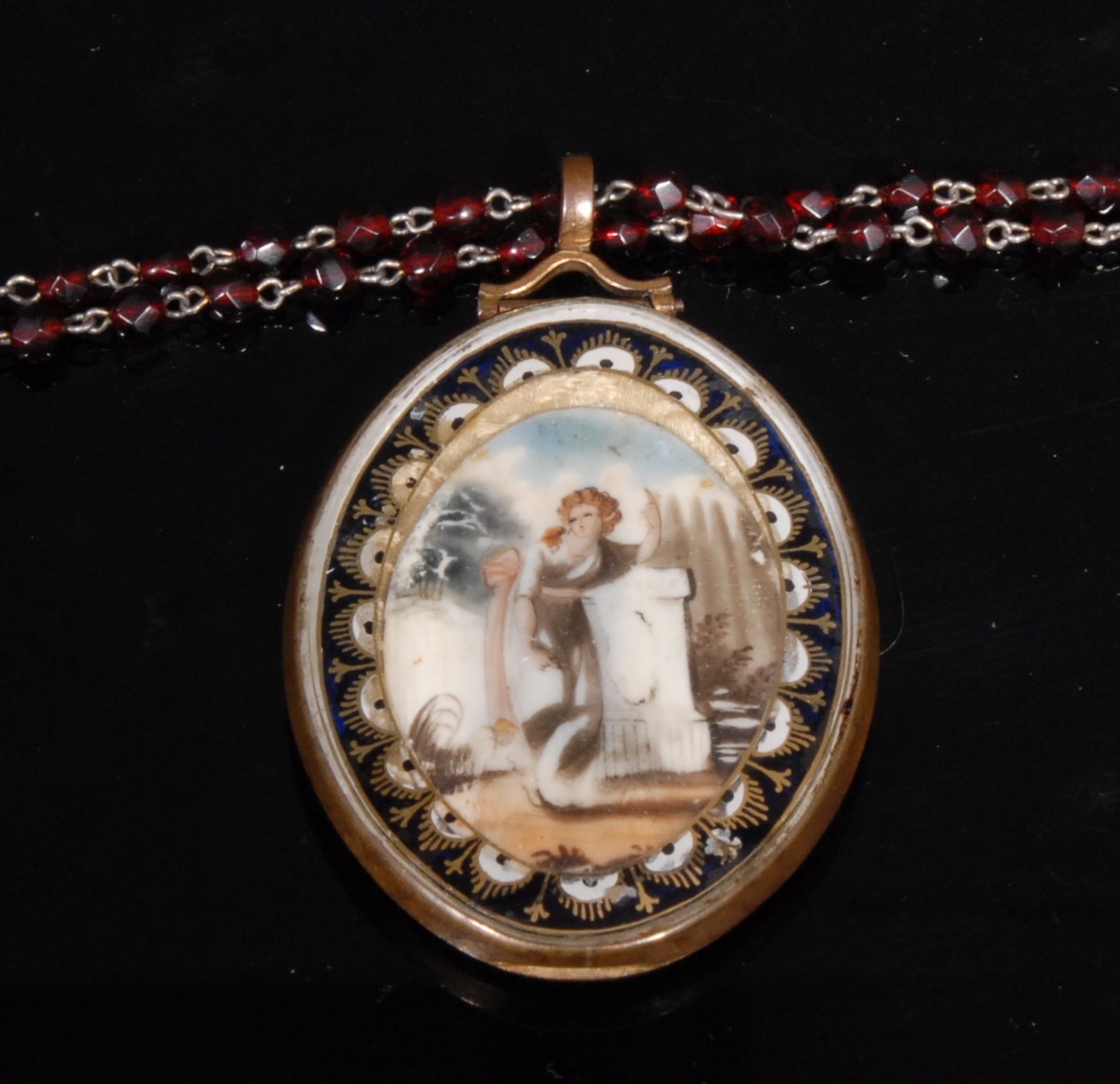 A late 18th/early 19th century mourning pendant, with blonde waxed hair, garnet rosary bead necklace - Image 2 of 3