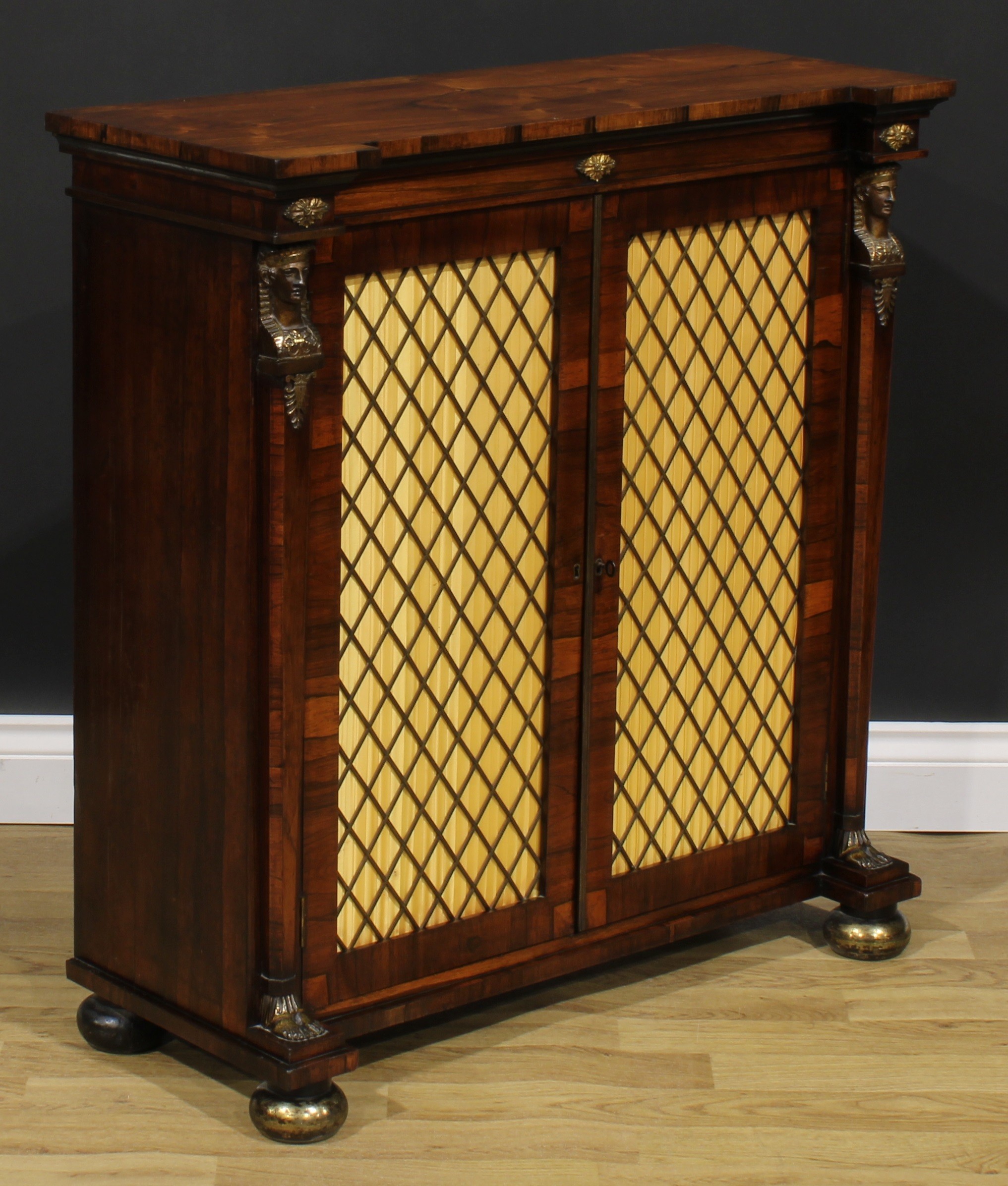 A Regency Egyptian Revival gilt metal mounted rosewood side cabinet, slightly oversailing top - Image 4 of 6