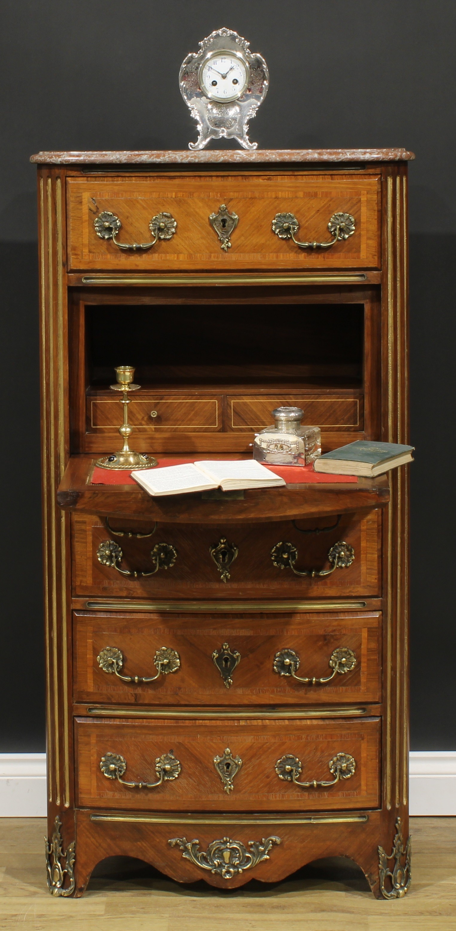 A Louis XV Revival gilt metal mounted secrétaire à abattant, marble top above an arrangement of