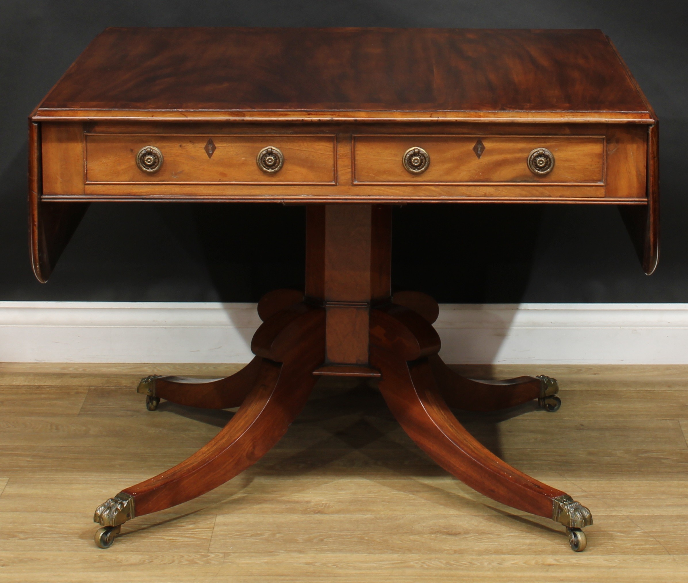 A Regency flame crossbanded mahogany sofa table, rounded rectangular top with fall leaves above a - Image 7 of 7
