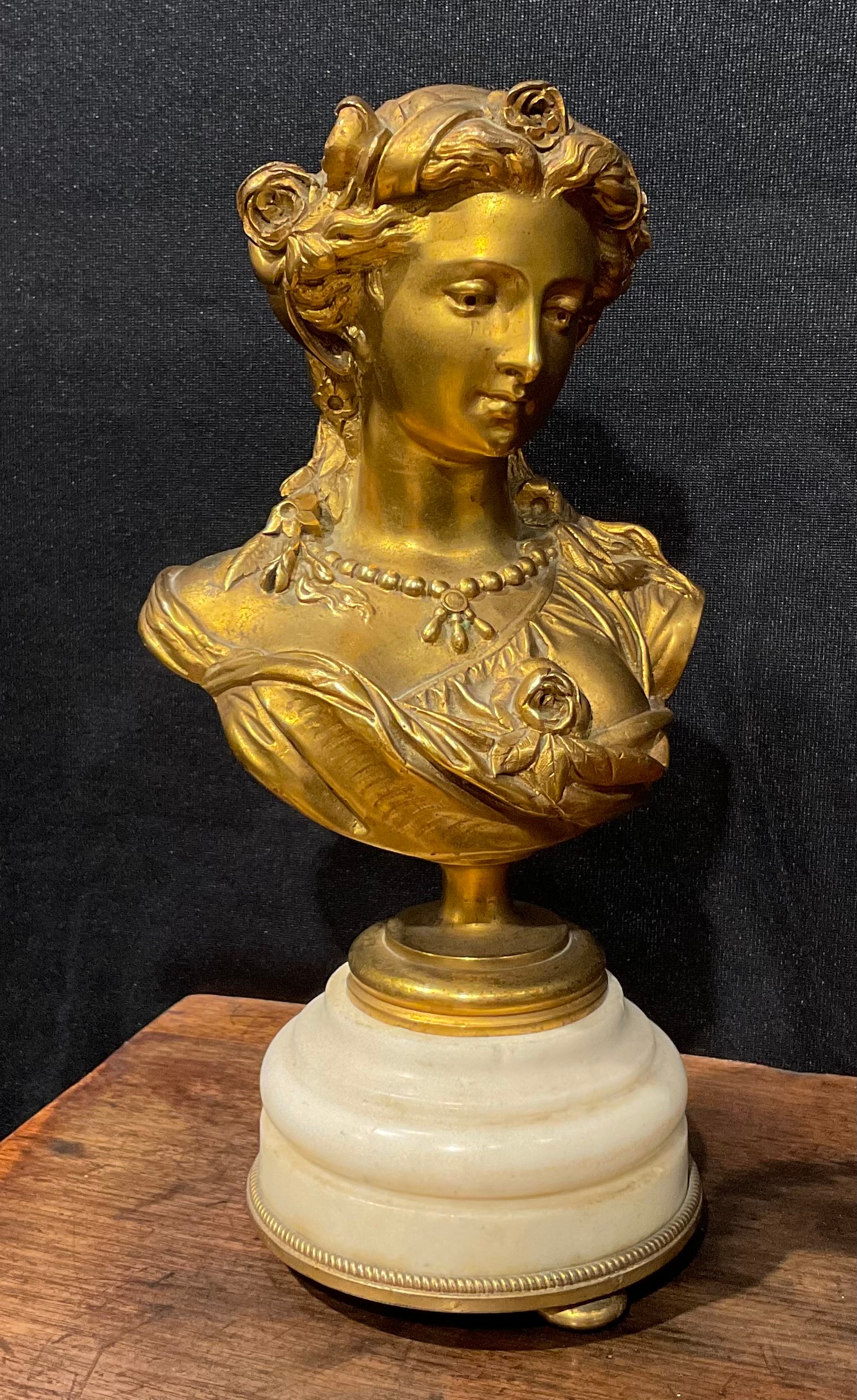 Albert-Ernest Carrier Belleuse (1824 - 1887), after, a gilt bronze bust, of a classical beauty,