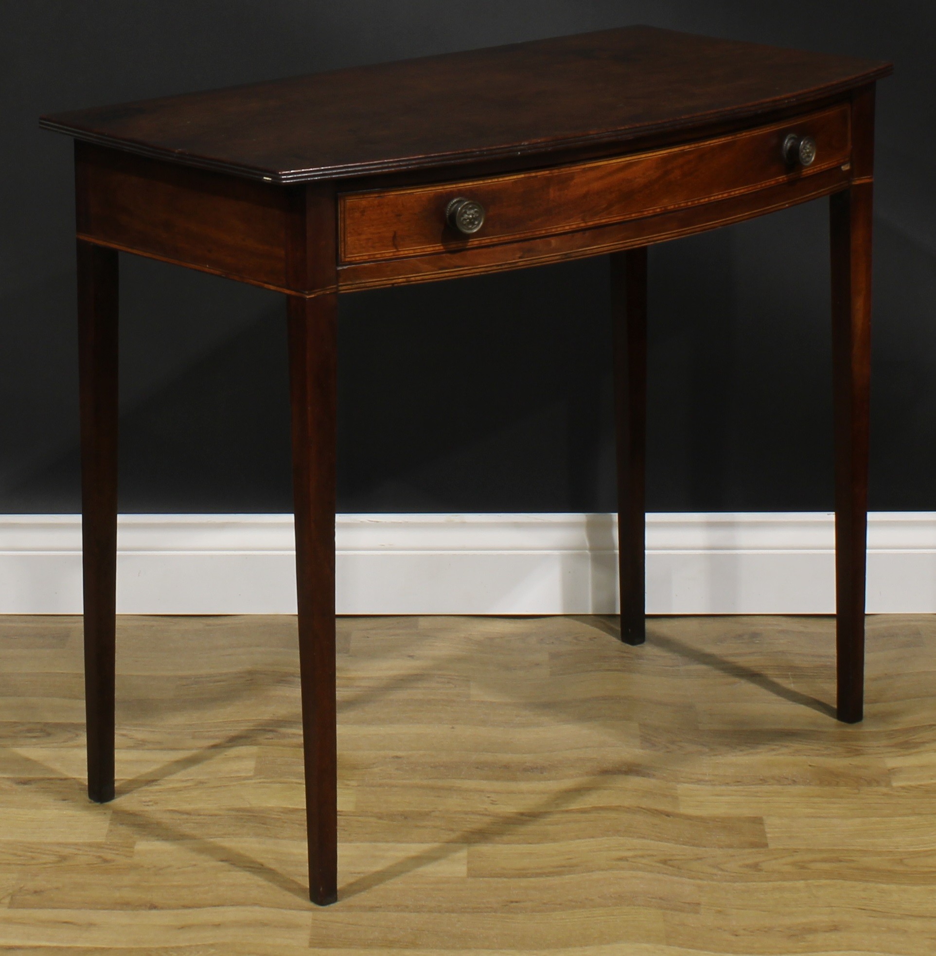 A George III mahogany bowfront side table, oversailing top with reeded edge above a long satinwood - Image 3 of 6