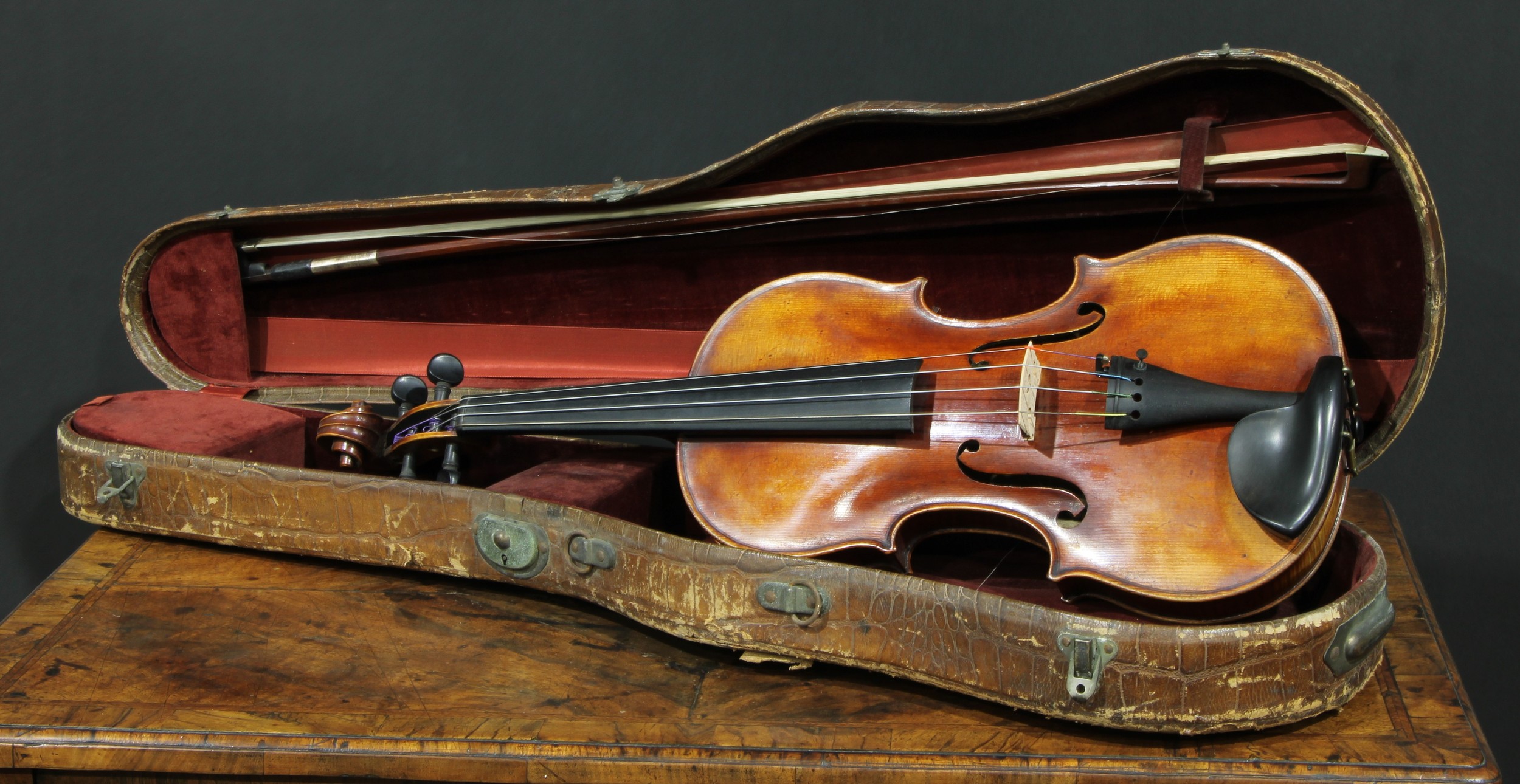 An Austrian violin, the one-piece back 60cm excluding button, paper label, Martinus Stoss, fecit