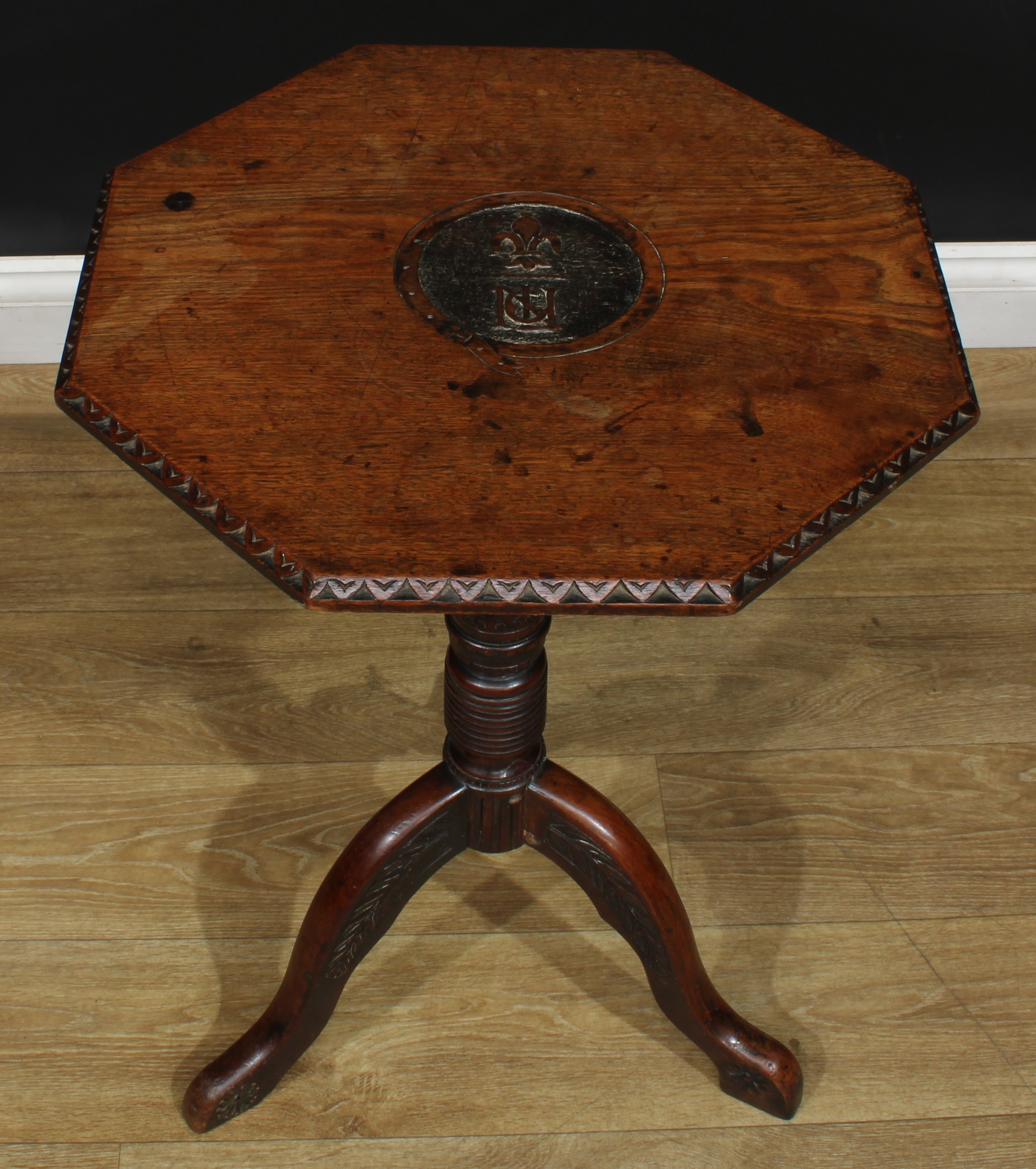 A 19th century oak tripod occasional table, possibly Masonic, octagonal top carved in relief with - Image 4 of 5
