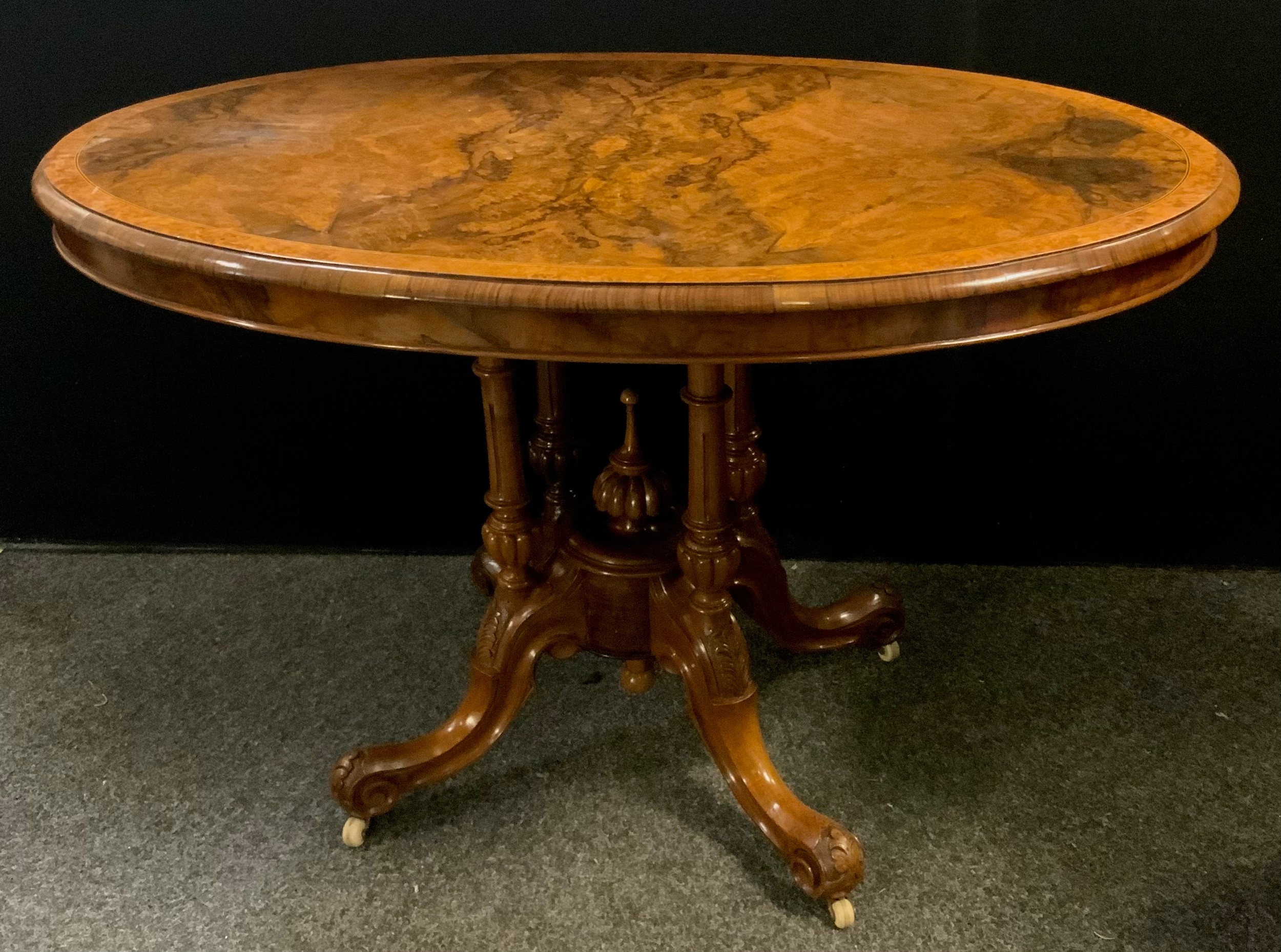 A late Victorian walnut oval centre/occasional table, well figured top, ebony and boxwood stringing, - Image 2 of 2