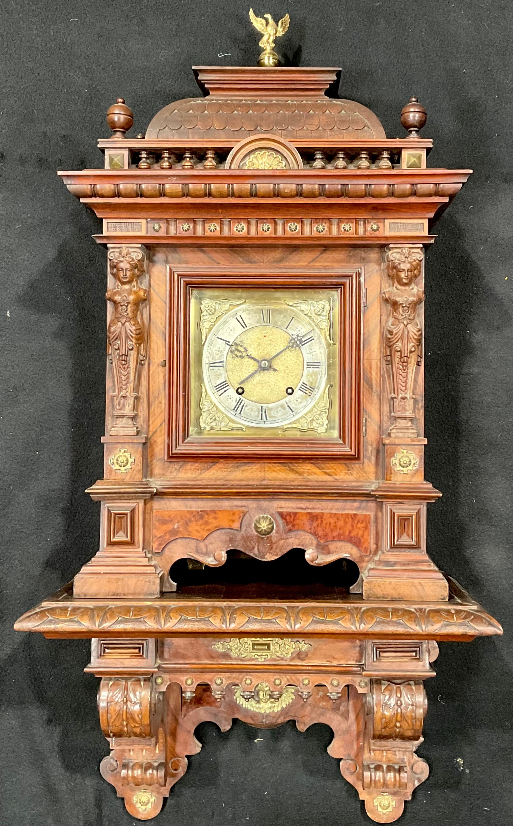 A late 19th/early 20th century German gilt metal mounted walnut bracket clock, 17cm square brass