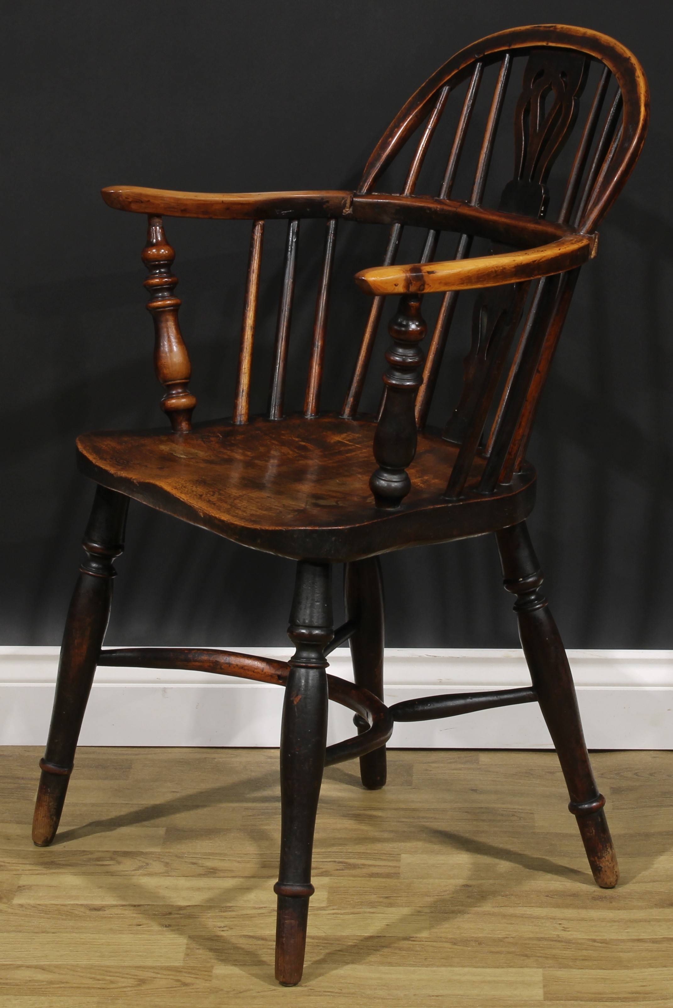 A 19th century East Midlands yew, ash and elm Windsor elbow chair, low hoop back, shaped and pierced - Image 3 of 4