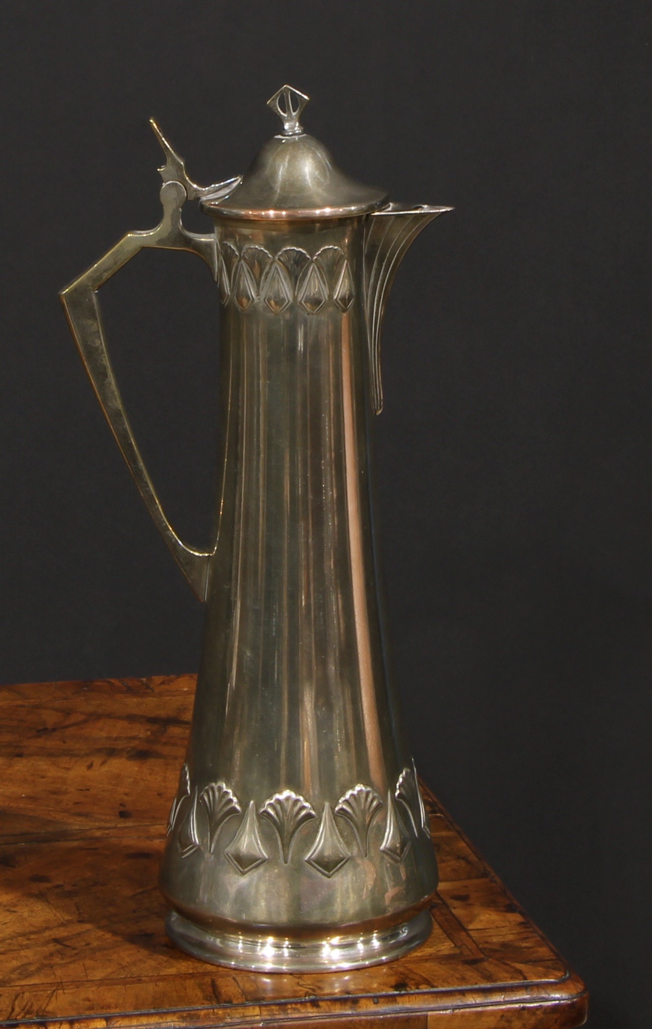 A W.M.F. Art Nouveau Jugendstil silver plated claret jug, Ginkgo design, of spreading cylindrical