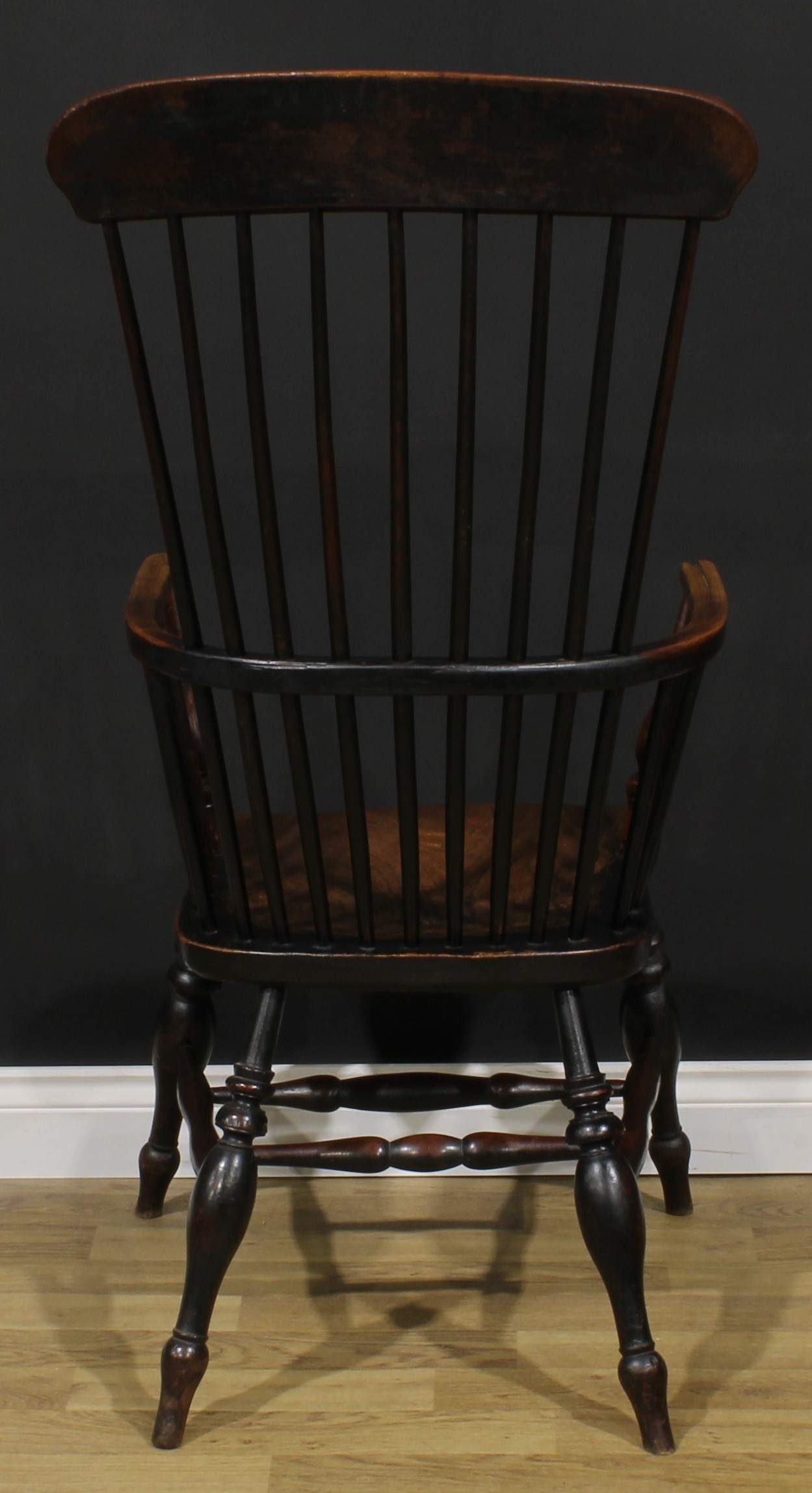 A 19th century fruitwood, elm, ash and beech Windsor elbow chair, tall tapered stick back, turned - Image 4 of 4