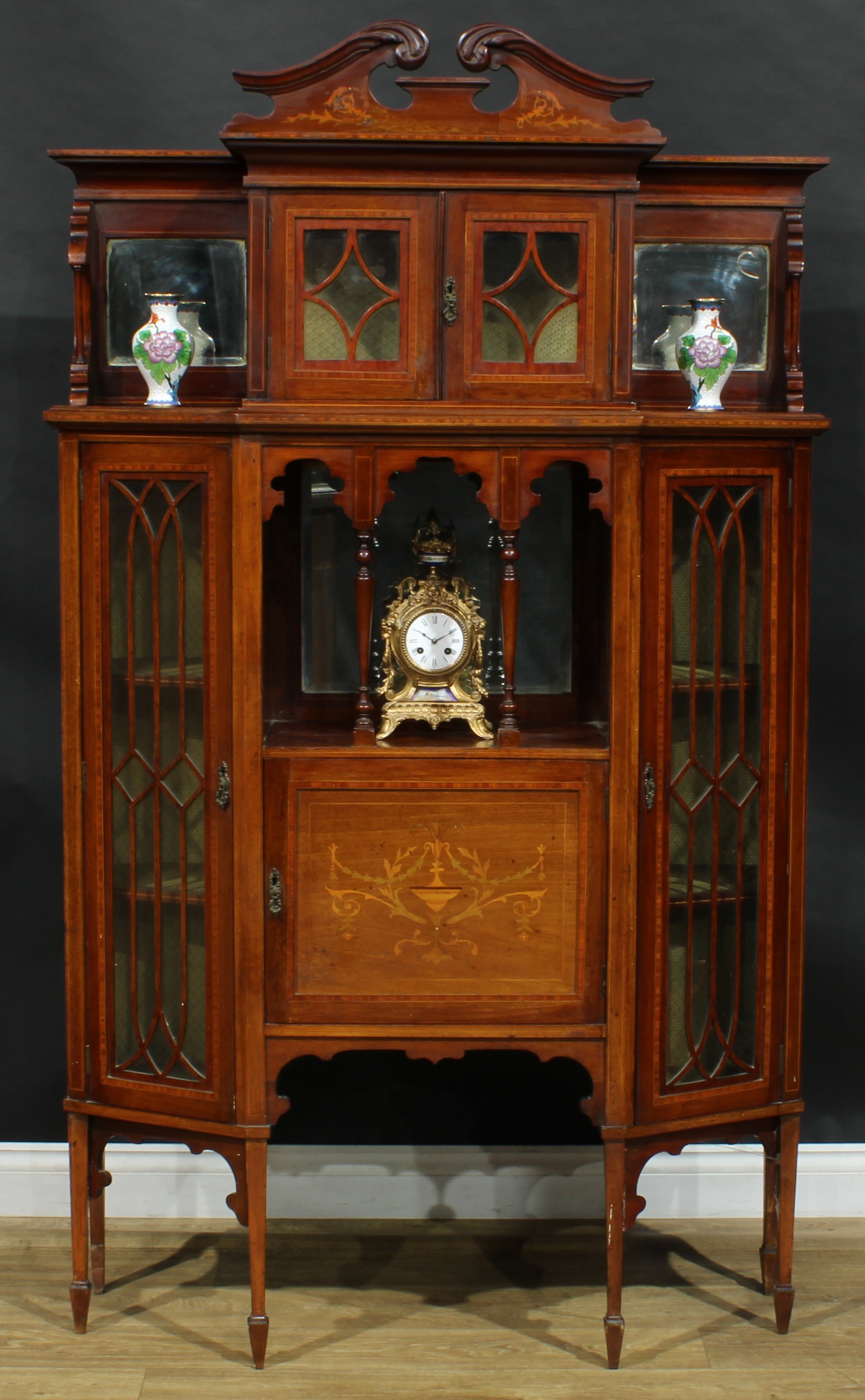 An Edwardian satinwood crossbanded mahogany and marquetry display cabinet, shaped superstructure