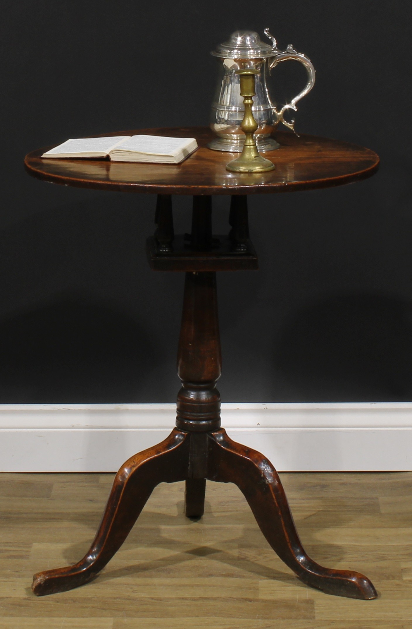 A George III oak and elm birdcage tripod occasional table, circular top, turned column, cabriole