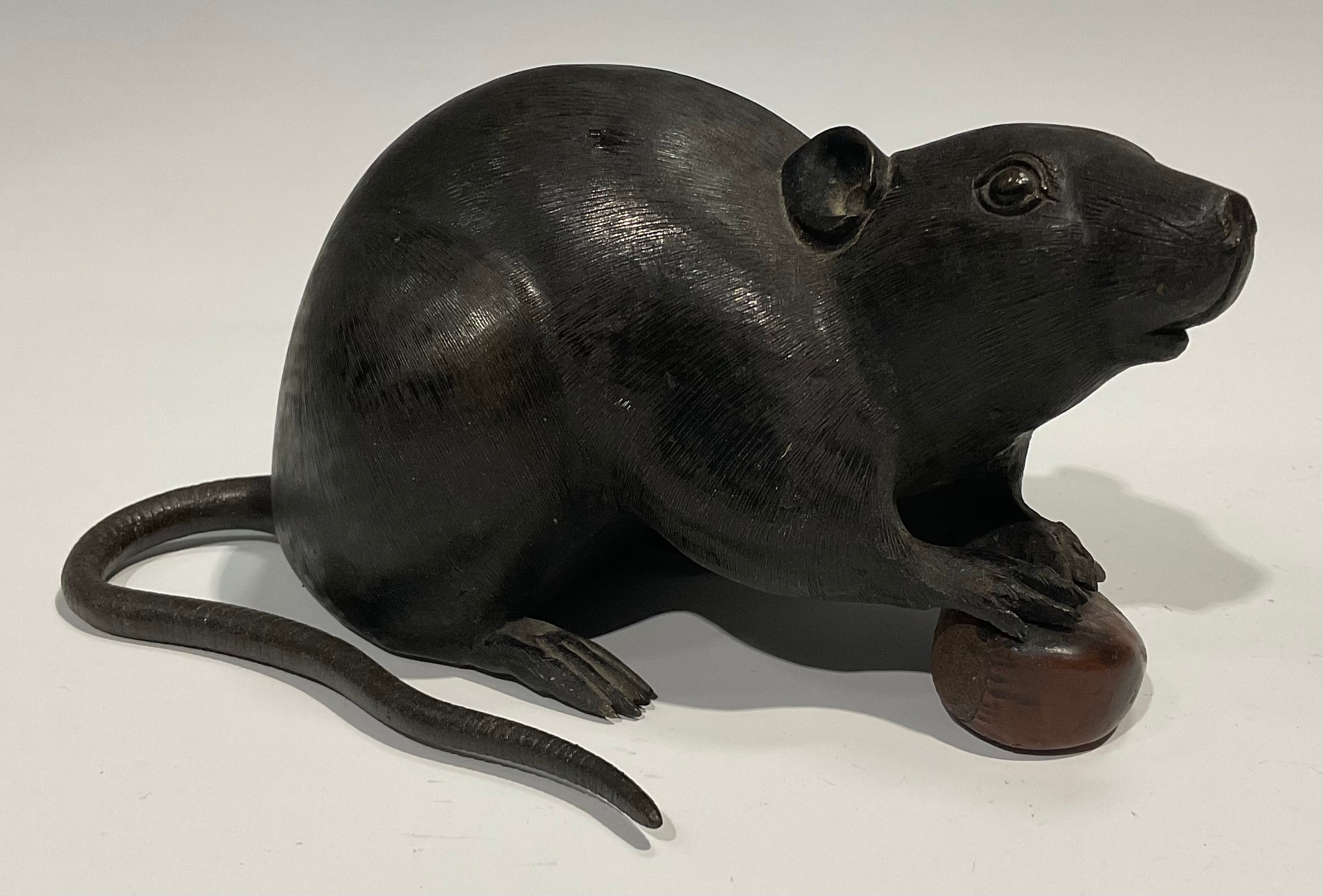 Japanese School (Meiji period), a dark and brown patinated bronze, of a rat holding a chestnut, 19cm - Image 2 of 6