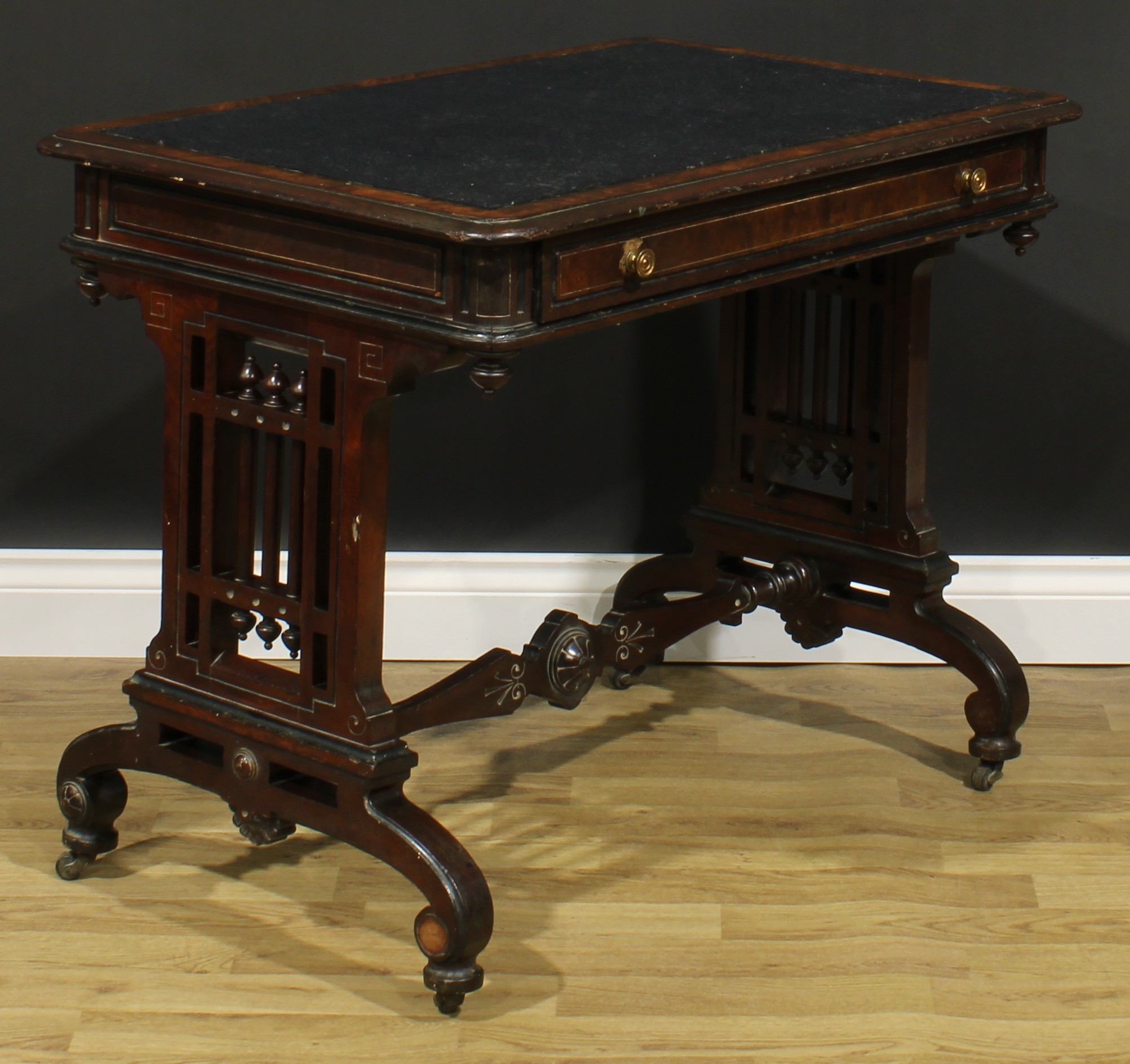 A late Victorian Aesthetic Movement walnut and mahogany writing table, rounded rectangular top above - Image 3 of 6