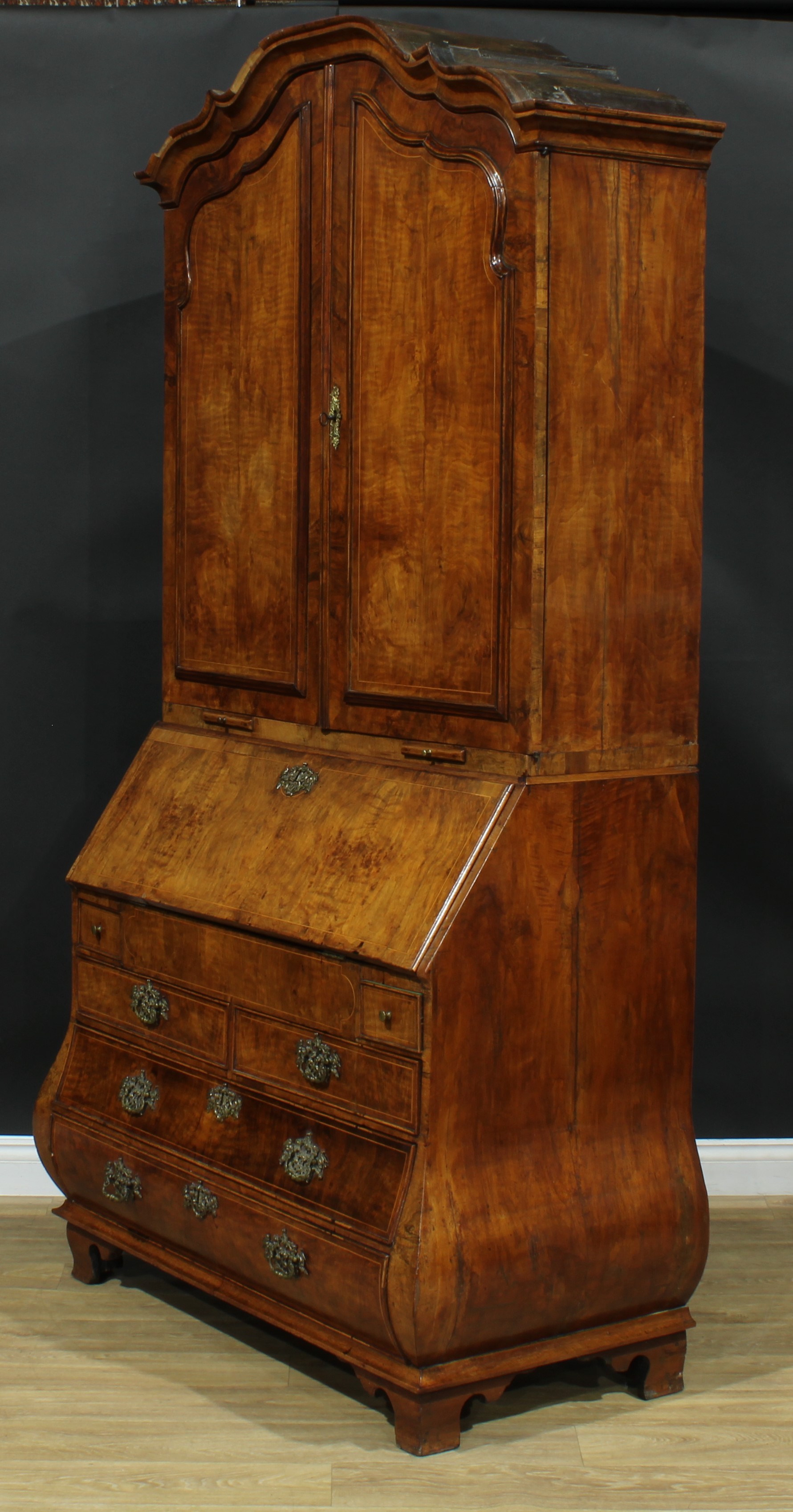 An 18th century Dutch walnut bureau book cabinet, the pair of panel doors above two candle slides - Image 8 of 9