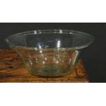 A George III aqua glass cream separator, folded rim, ground pontil mark, 33cm diameter x 13cm high